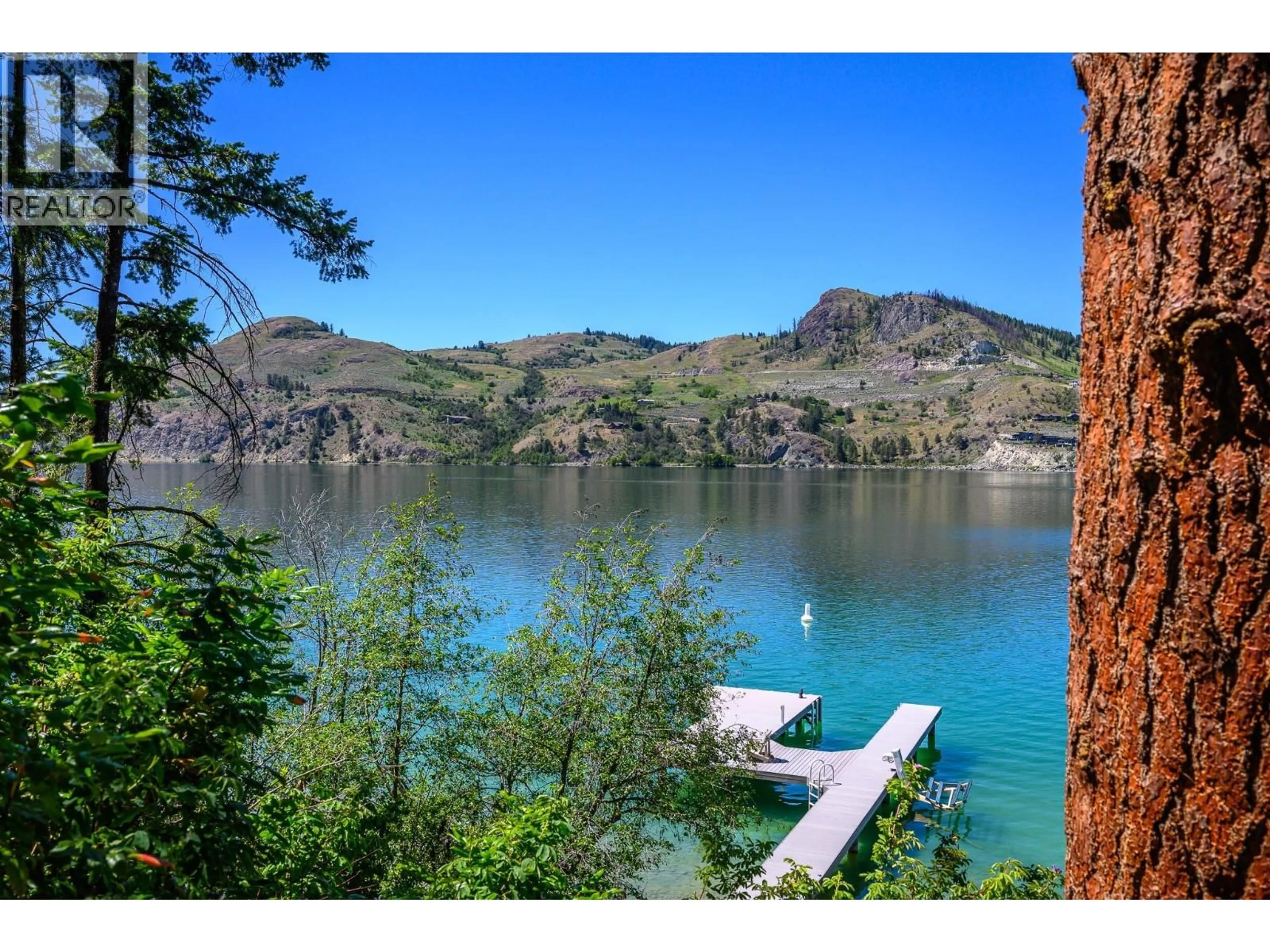 A pic from outside/outdoor area/front of a property/back of a property/a pic from drone, water/lake/river/ocean view for 5 - 12877 KIDSTON ROAD, Coldstream British Columbia V1B1Z4
