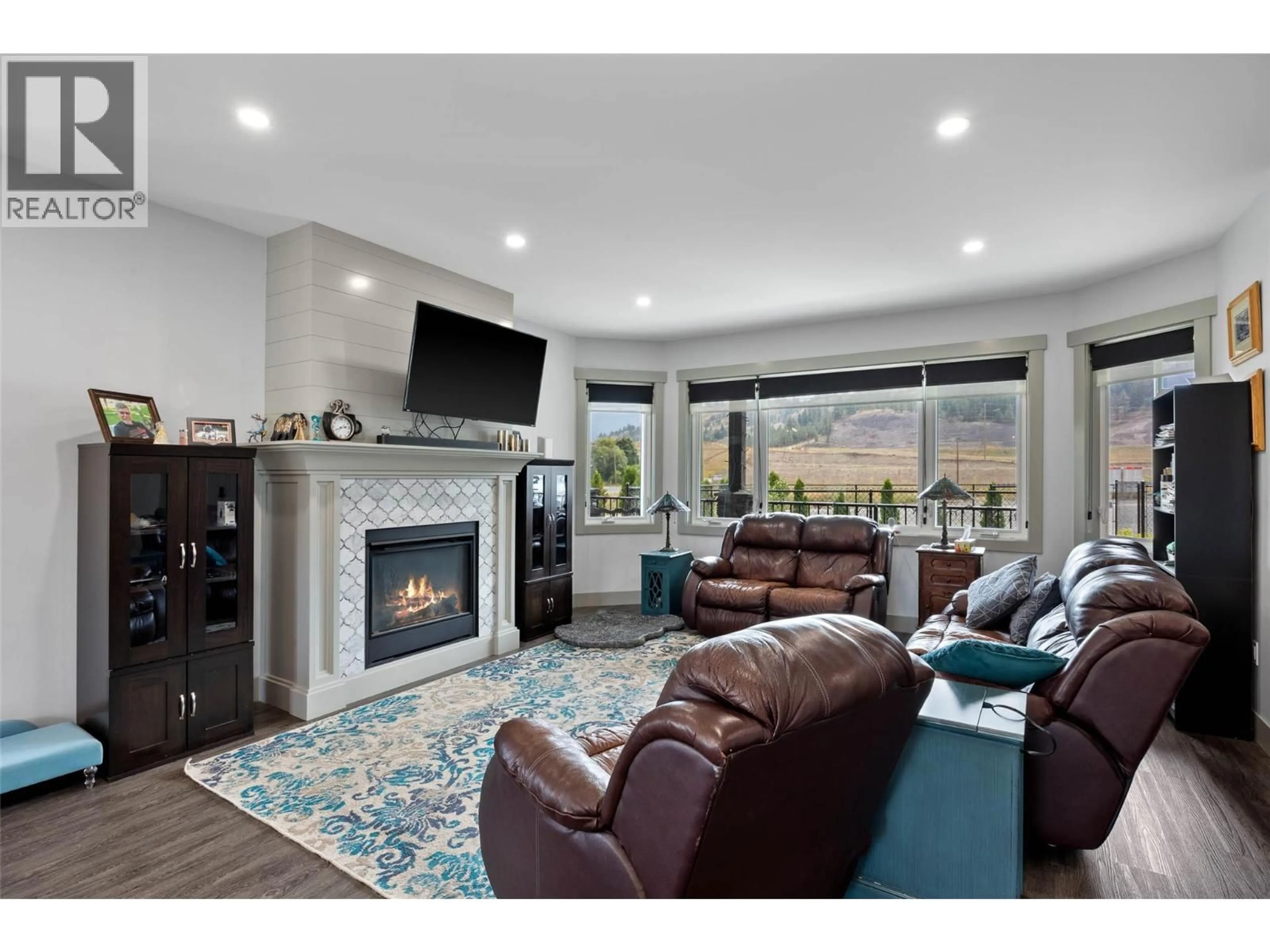 Living room with furniture, ceramic/tile floor for 2016 BIRCH AVENUE, Merritt British Columbia V1K1K2
