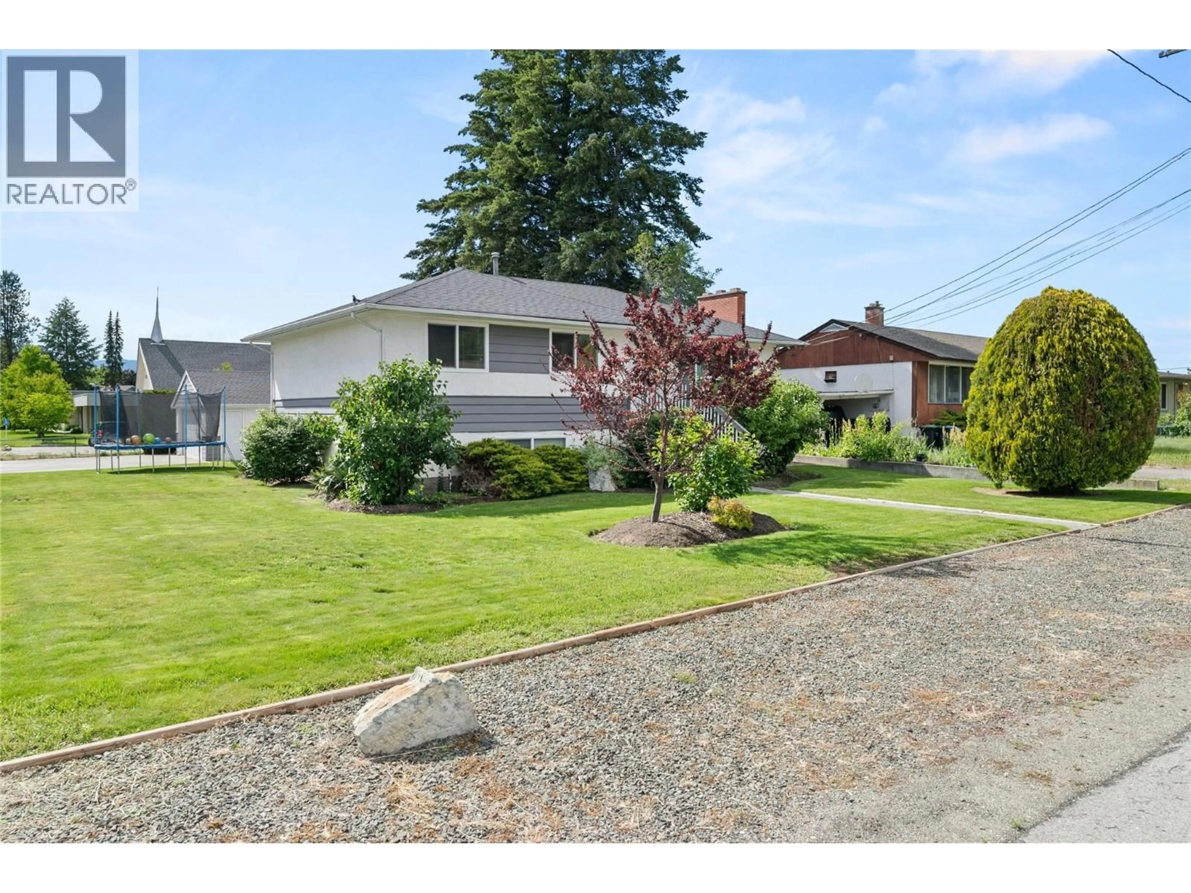 A pic from outside/outdoor area/front of a property/back of a property/a pic from drone, street for 260 GIBBS ROAD, Kelowna British Columbia V1X2W1