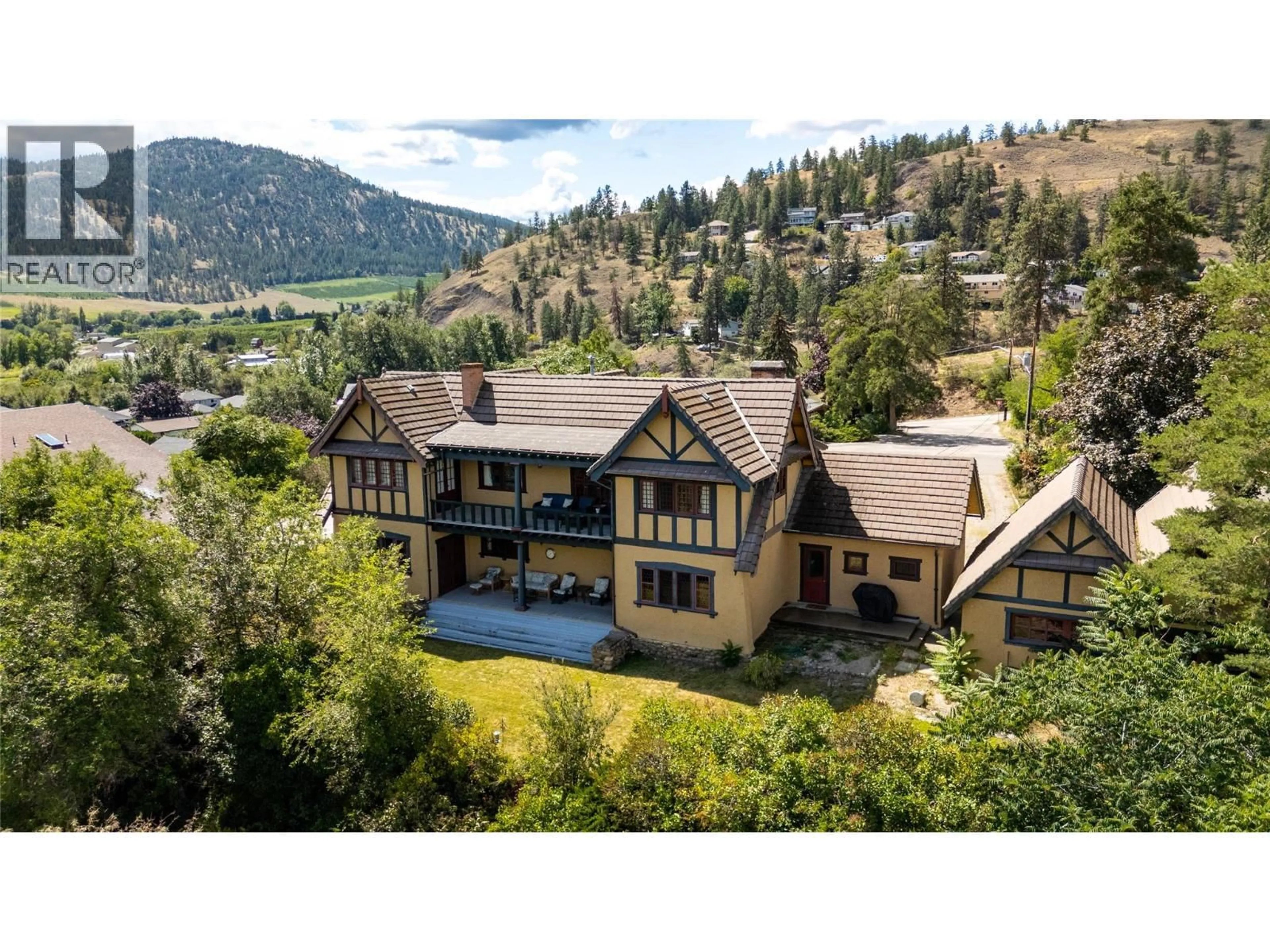 A pic from outside/outdoor area/front of a property/back of a property/a pic from drone, mountain view for 12405 REYNOLDS AVENUE, Summerland British Columbia V0H1Z8