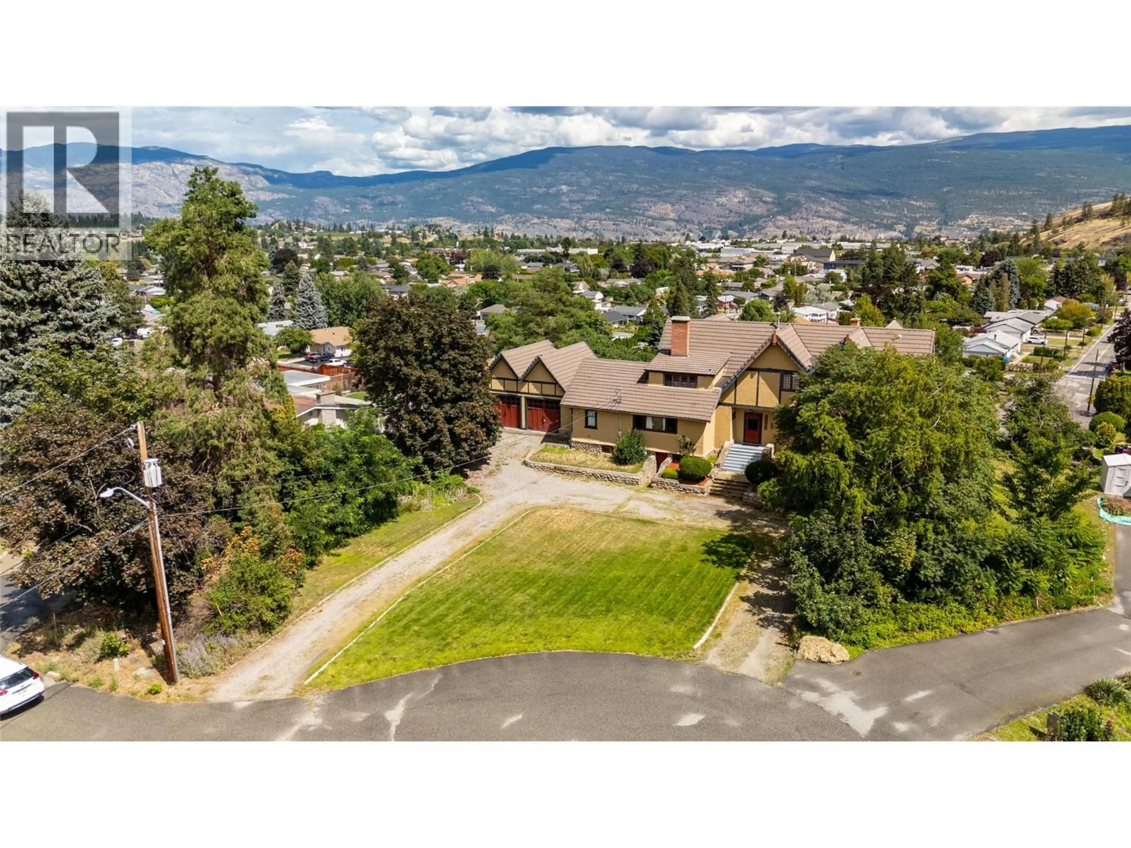 A pic from outside/outdoor area/front of a property/back of a property/a pic from drone, mountain view for 12405 REYNOLDS AVENUE, Summerland British Columbia V0H1Z8