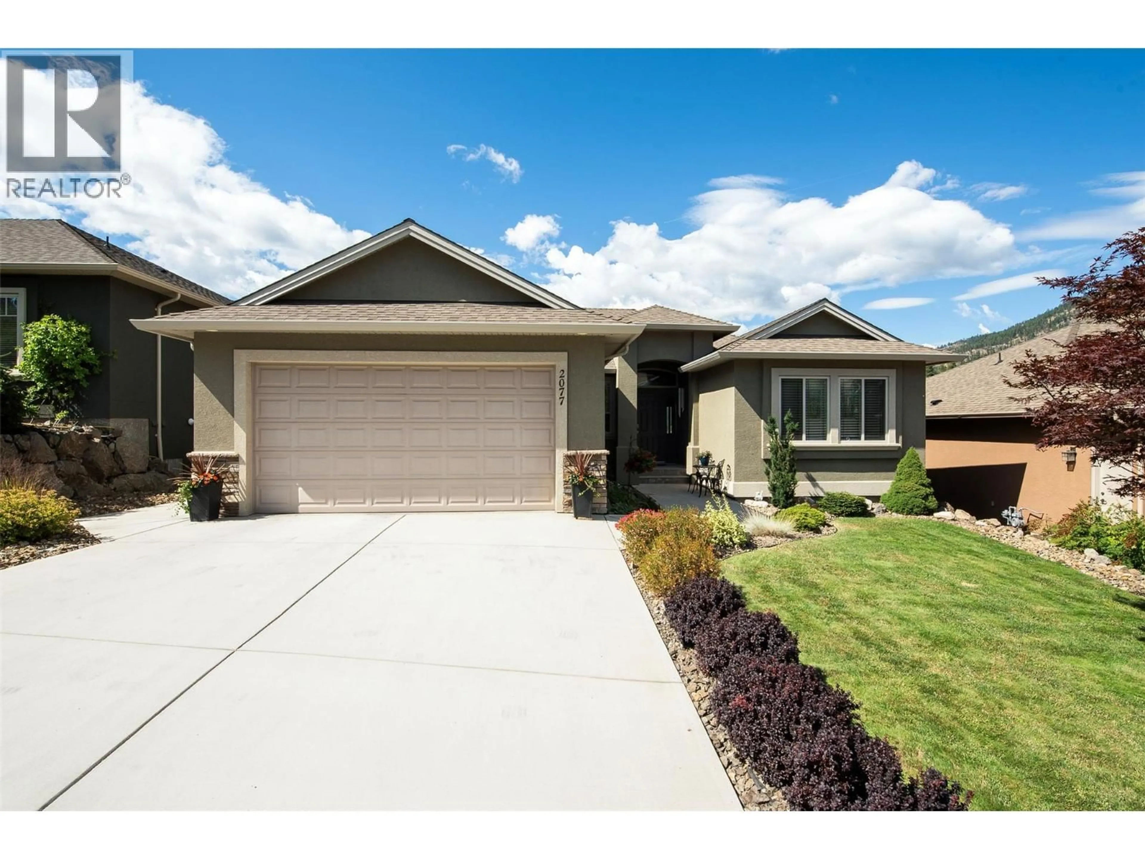 Home with brick exterior material, street for 2077 CORNERSTONE DRIVE, West Kelowna British Columbia V4T2Y3