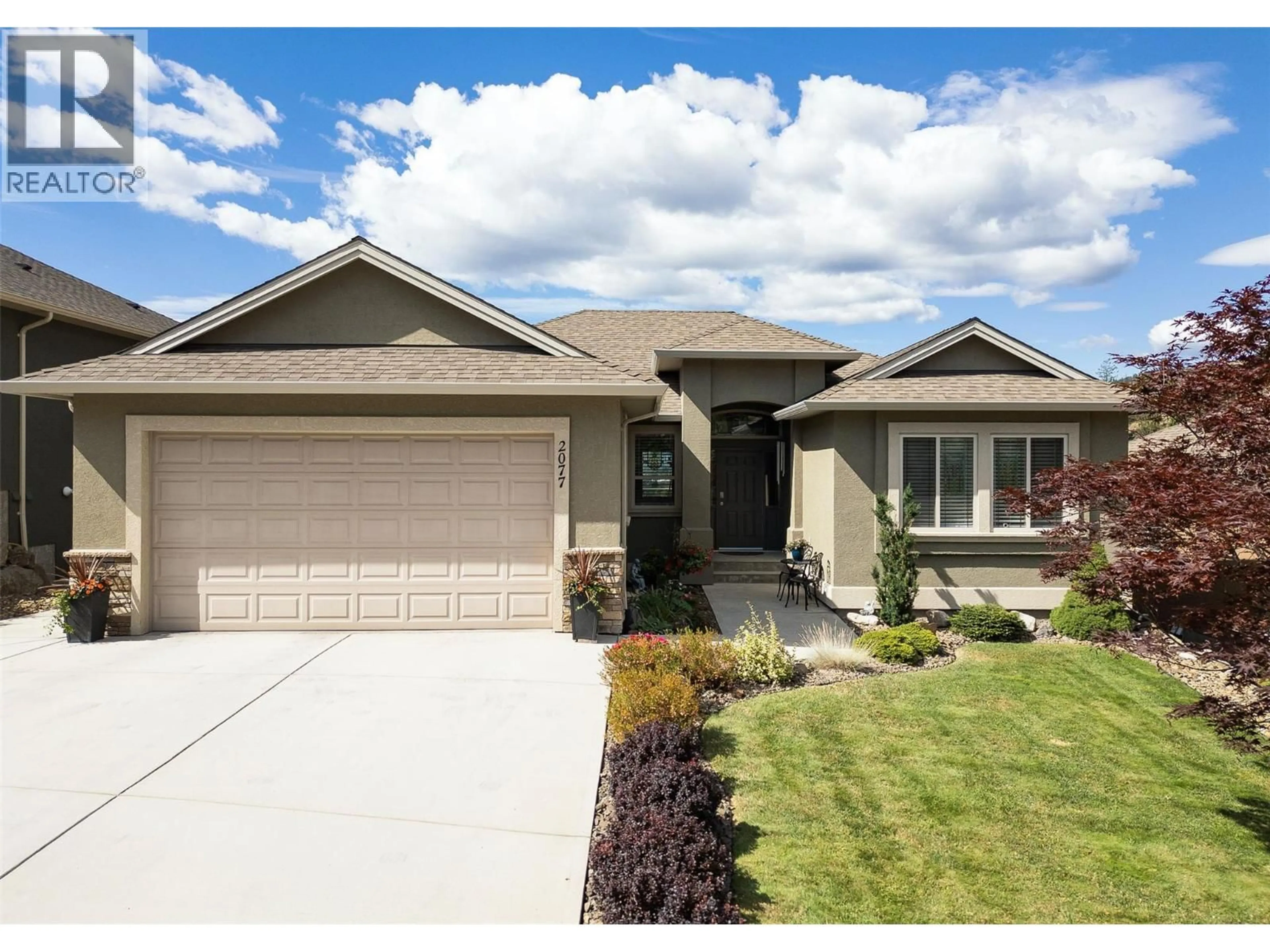 Home with vinyl exterior material, street for 2077 CORNERSTONE DRIVE, West Kelowna British Columbia V4T2Y3