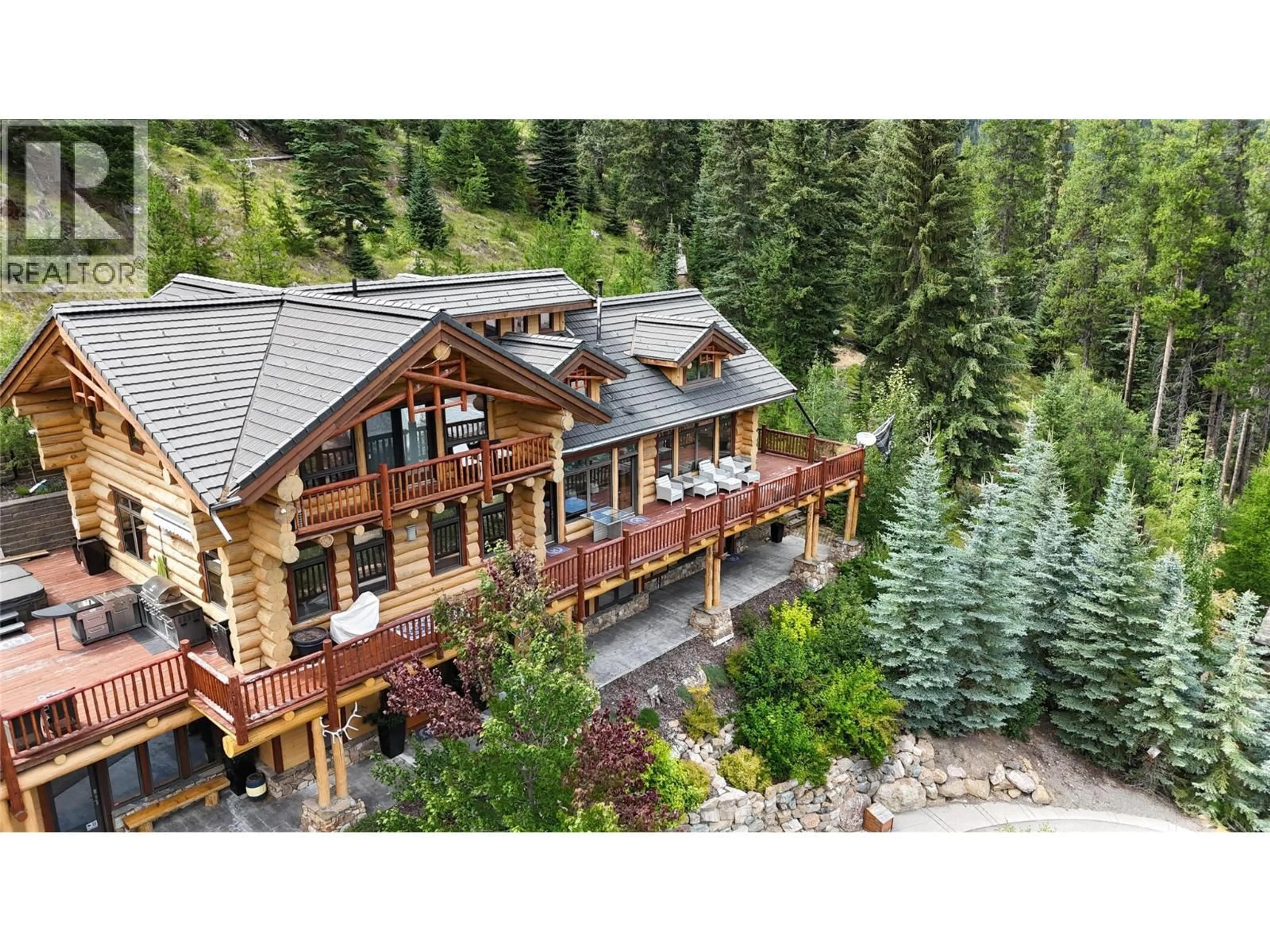 A pic from outside/outdoor area/front of a property/back of a property/a pic from drone, mountain view for 1783 GREYWOLF DRIVE, Panorama British Columbia V0A1T0