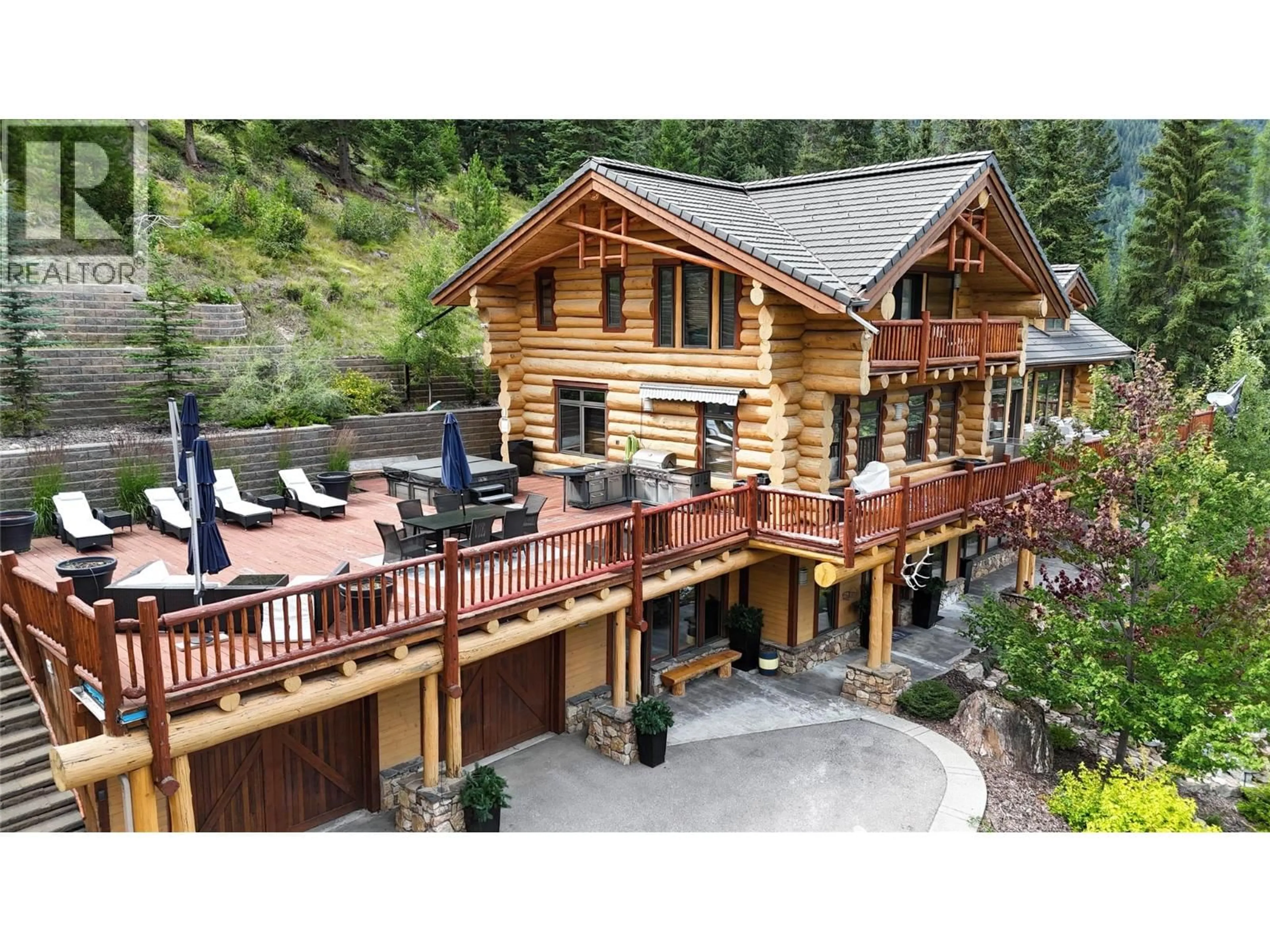 A pic from outside/outdoor area/front of a property/back of a property/a pic from drone, mountain view for 1783 GREYWOLF DRIVE, Panorama British Columbia V0A1T0