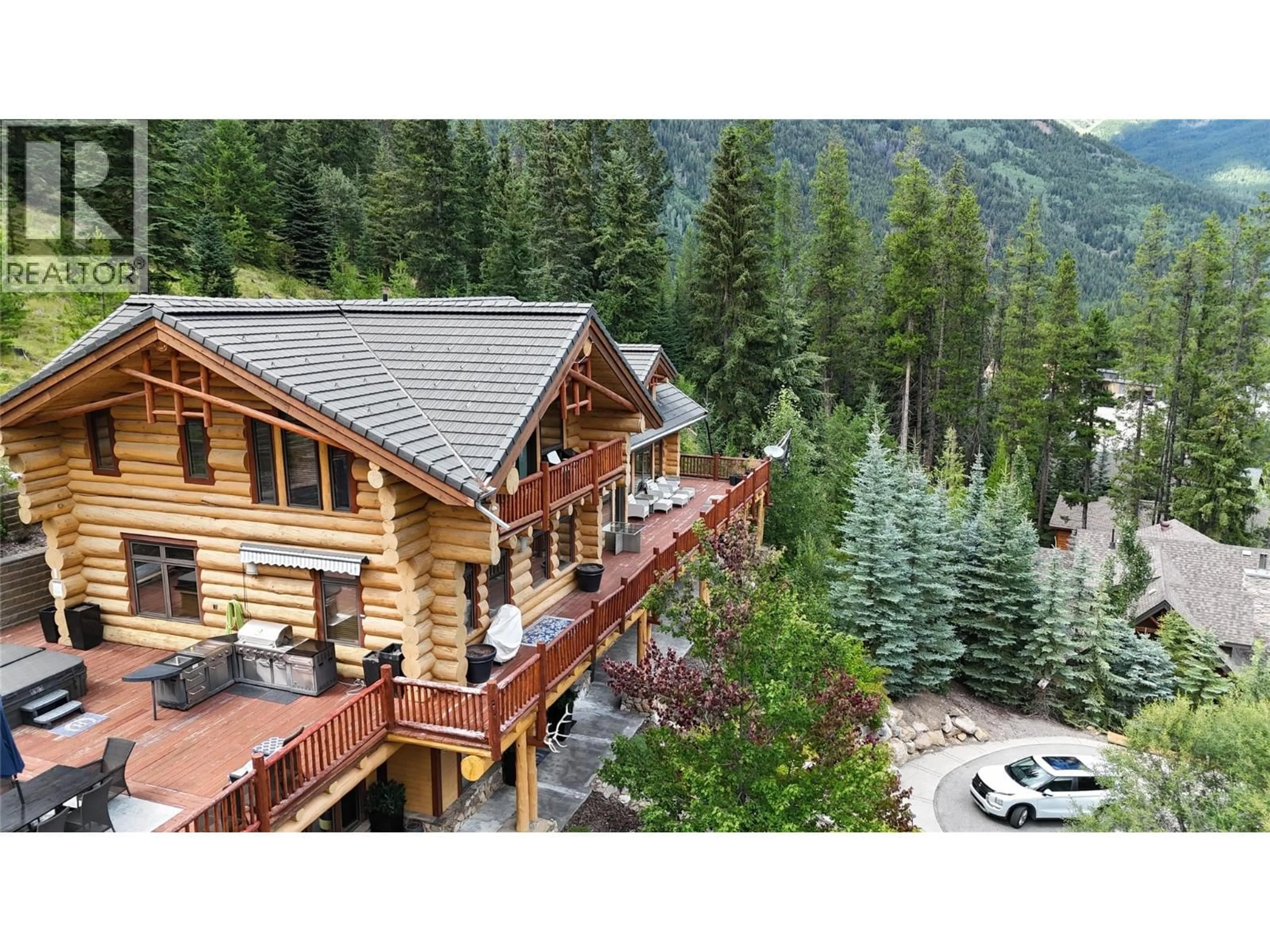 A pic from outside/outdoor area/front of a property/back of a property/a pic from drone, mountain view for 1783 GREYWOLF DRIVE, Panorama British Columbia V0A1T0