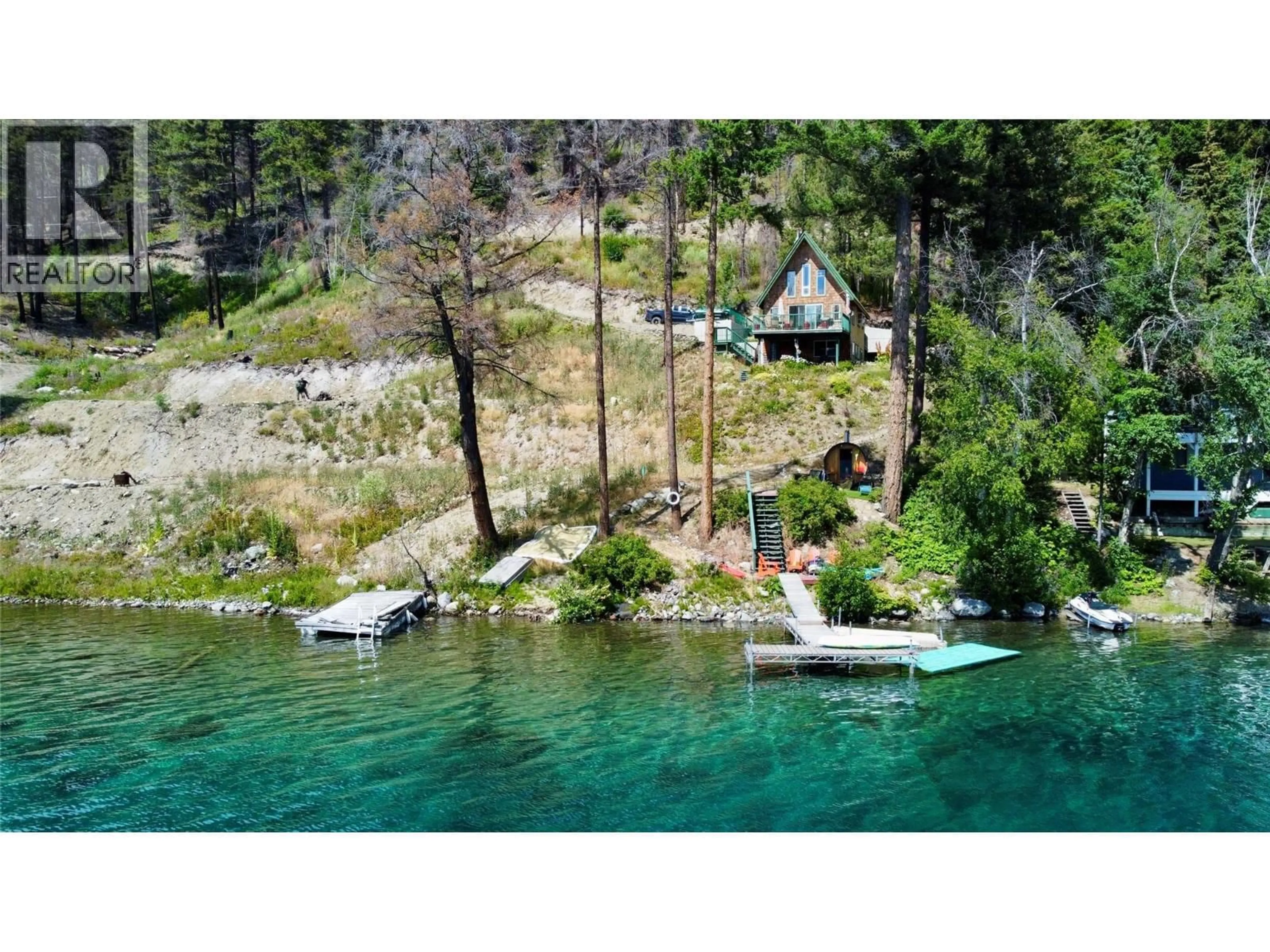 A pic from outside/outdoor area/front of a property/back of a property/a pic from drone, water/lake/river/ocean view for 9348 GUN LAKE ROAD WEST, Gold Bridge British Columbia V0K1P0