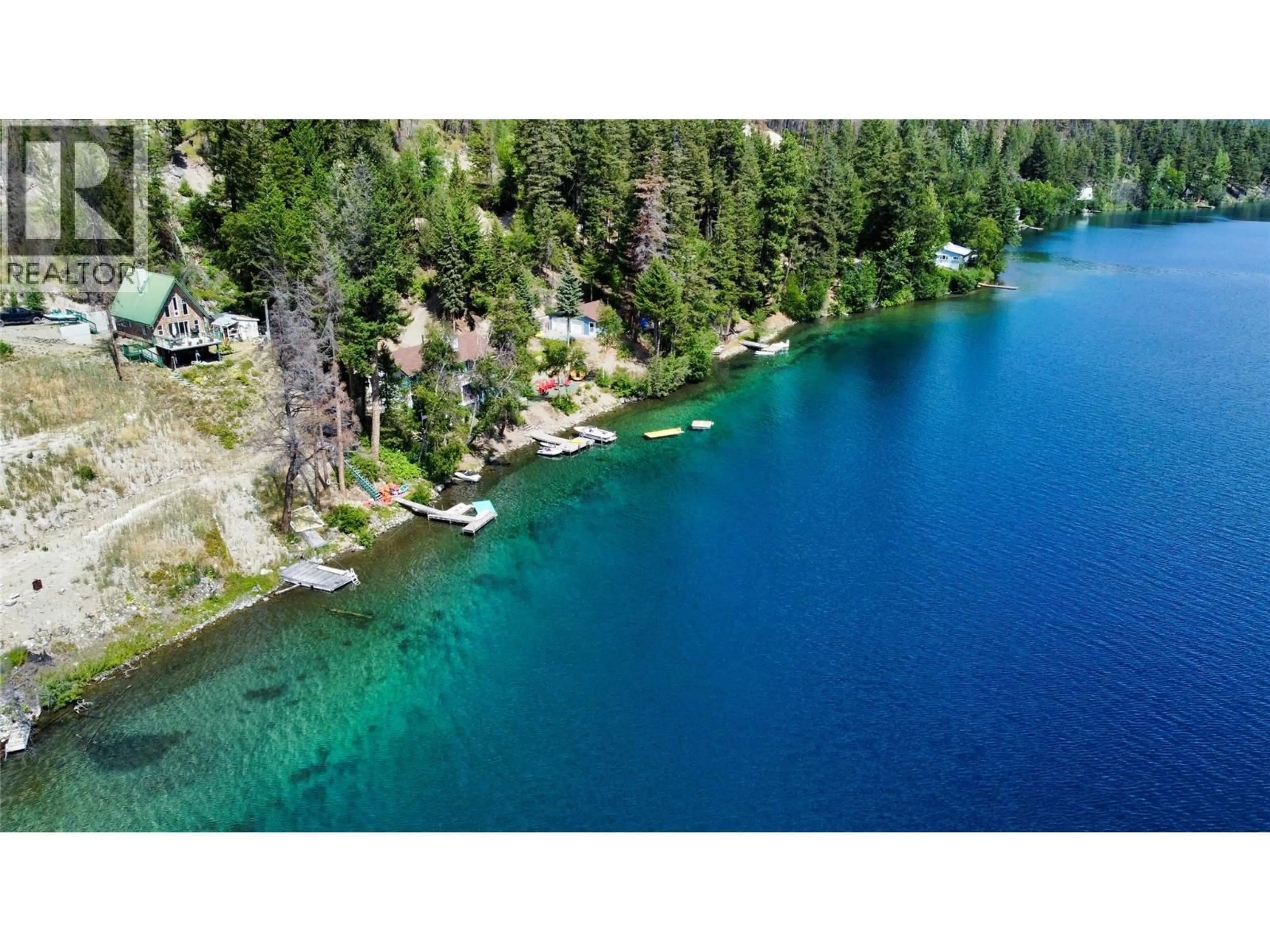 A pic from outside/outdoor area/front of a property/back of a property/a pic from drone, water/lake/river/ocean view for 9348 GUN LAKE ROAD WEST, Gold Bridge British Columbia V0K1P0