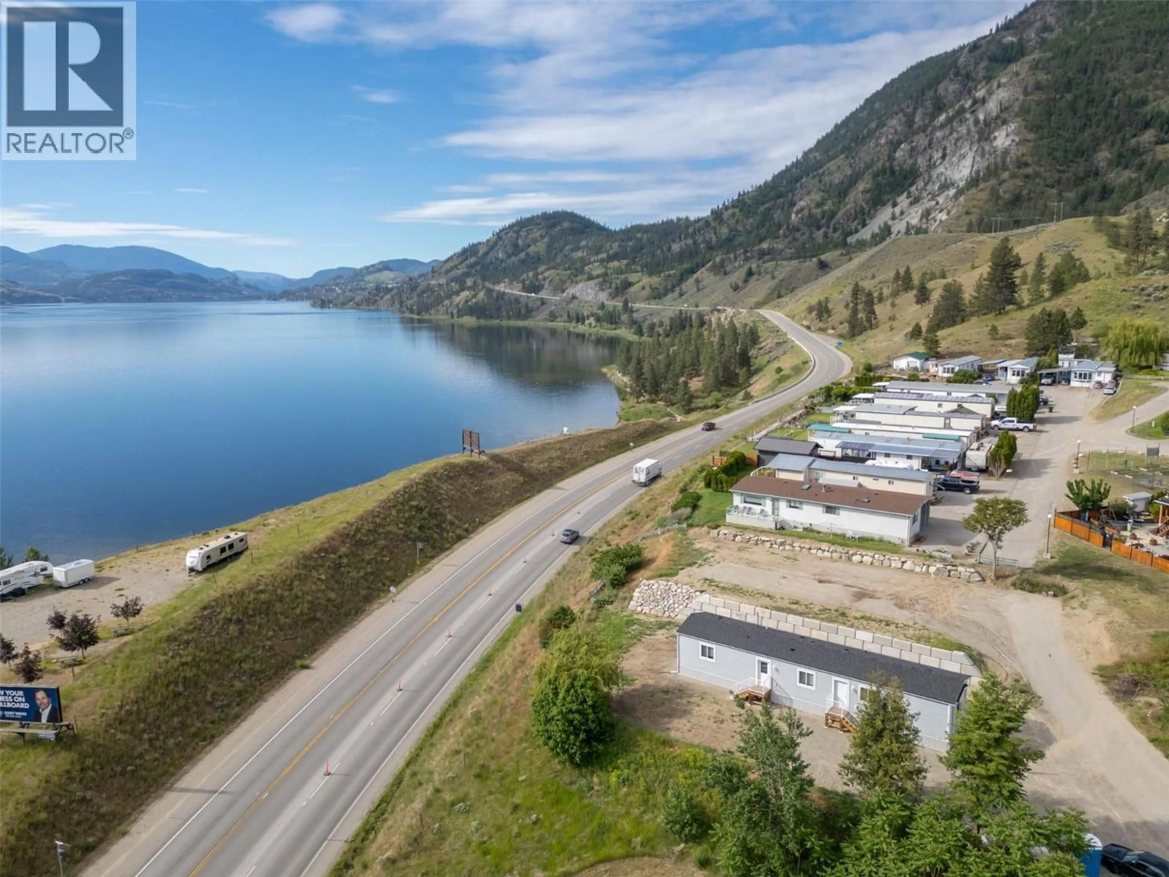 A pic from outside/outdoor area/front of a property/back of a property/a pic from drone, water/lake/river/ocean view for 40 - 201 HIGHWAY 97 HIGHWAY, Penticton British Columbia V2A0E4