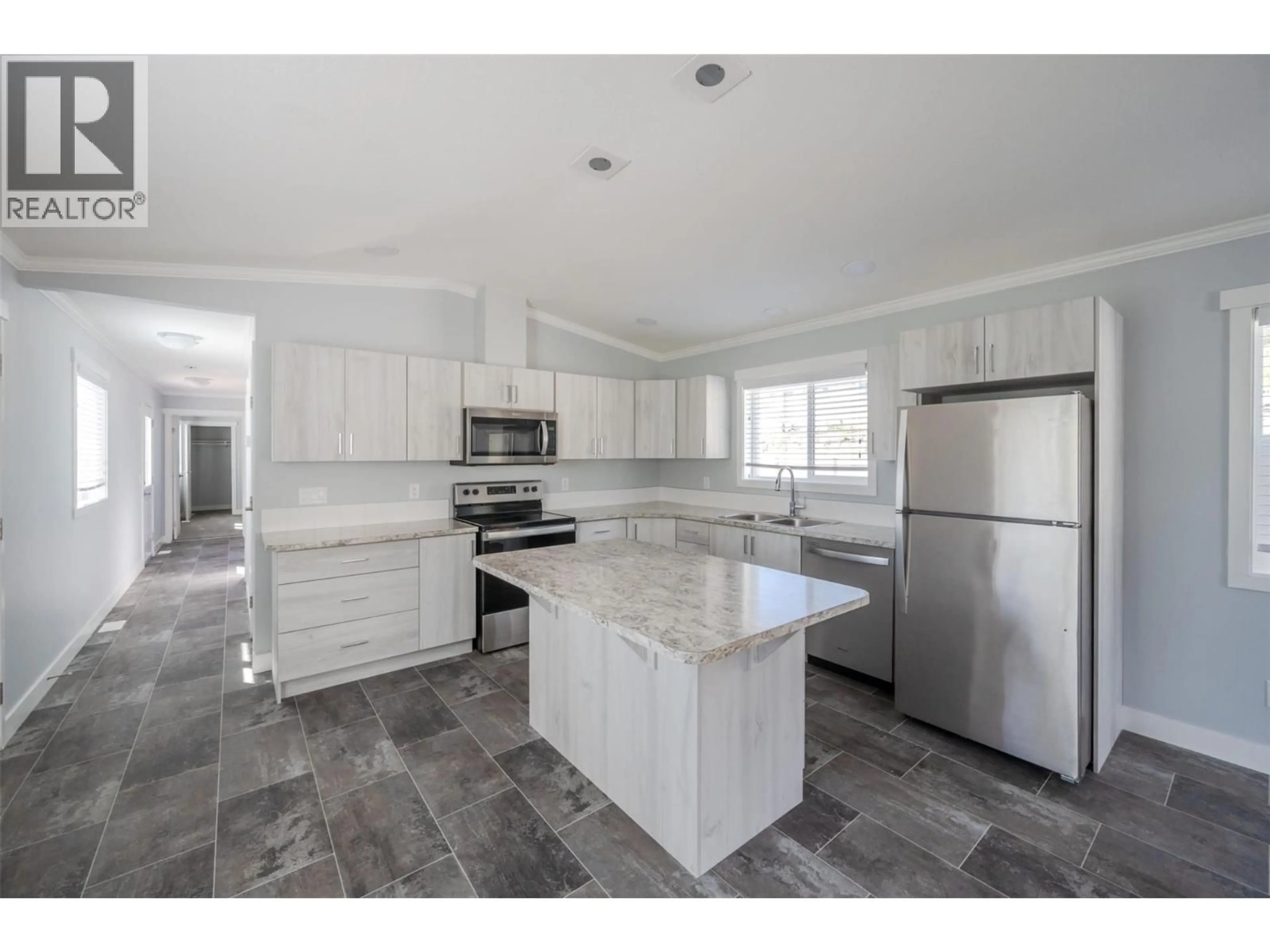 Open concept kitchen, ceramic/tile floor for 40 - 201 HIGHWAY 97 HIGHWAY, Penticton British Columbia V2A0E4