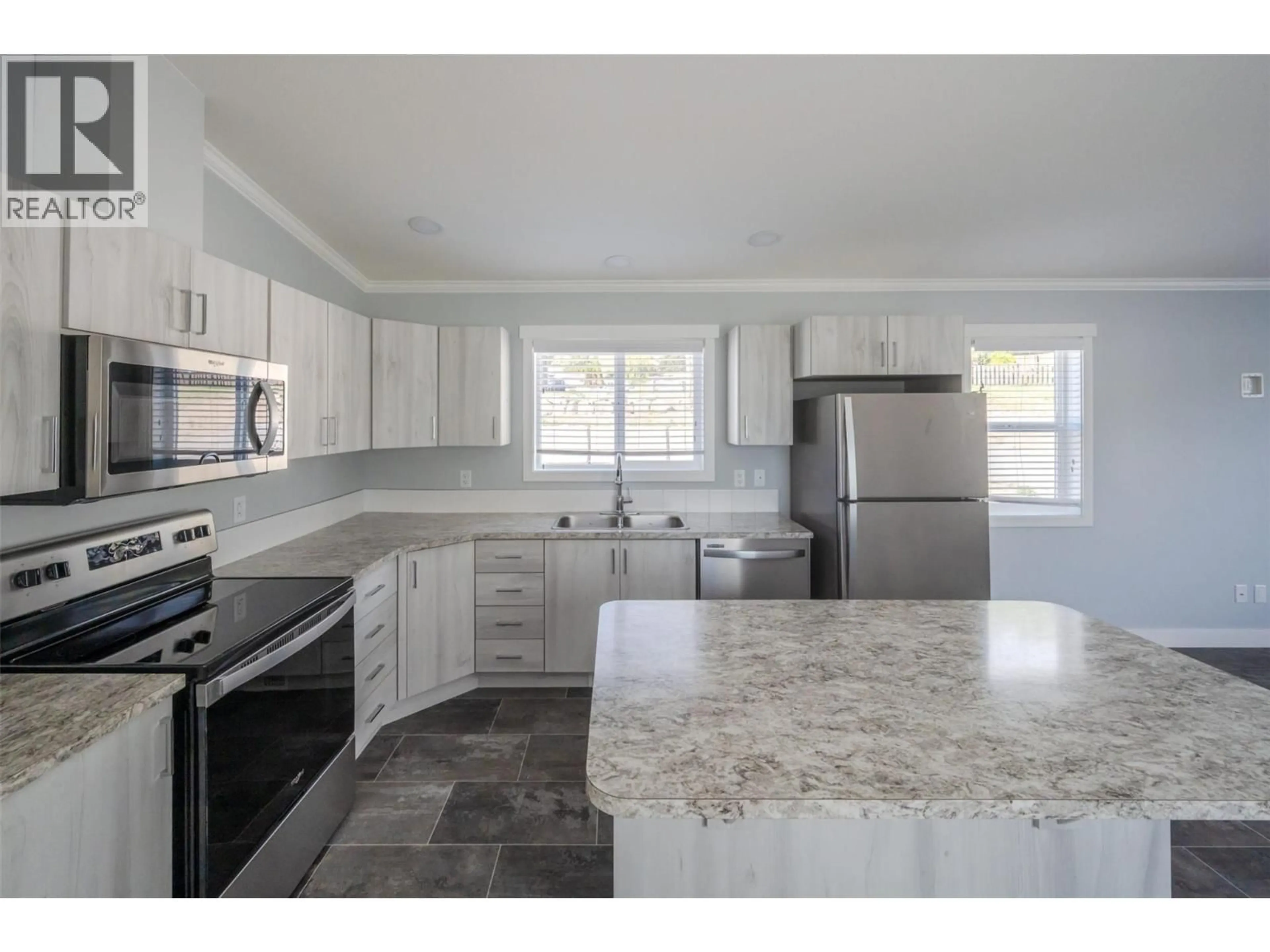 Open concept kitchen, ceramic/tile floor for 40 - 201 HIGHWAY 97 HIGHWAY, Penticton British Columbia V2A0E4