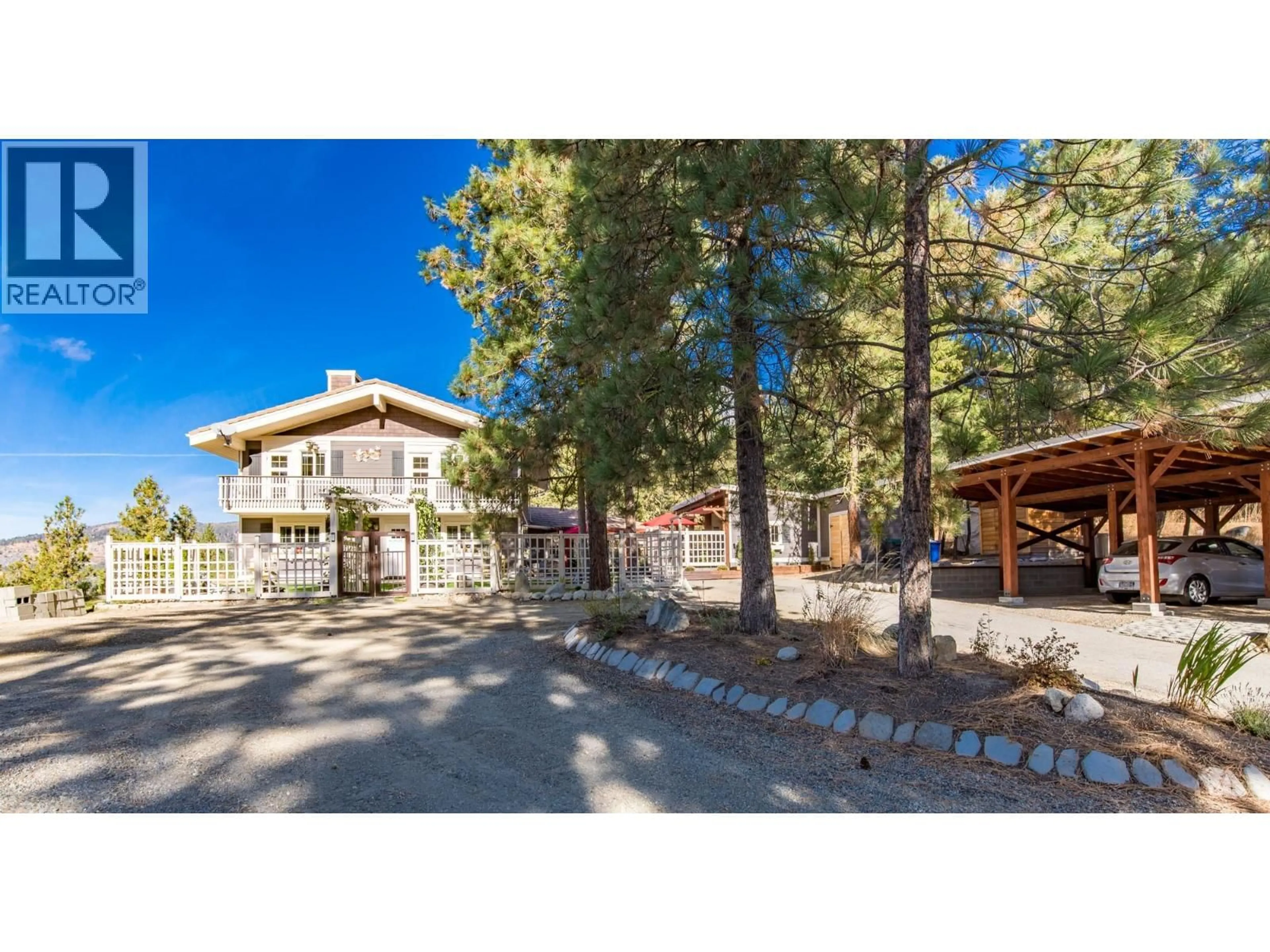 A pic from outside/outdoor area/front of a property/back of a property/a pic from drone, street for 205 PEREGRINE COURT, Osoyoos British Columbia V0H1V6
