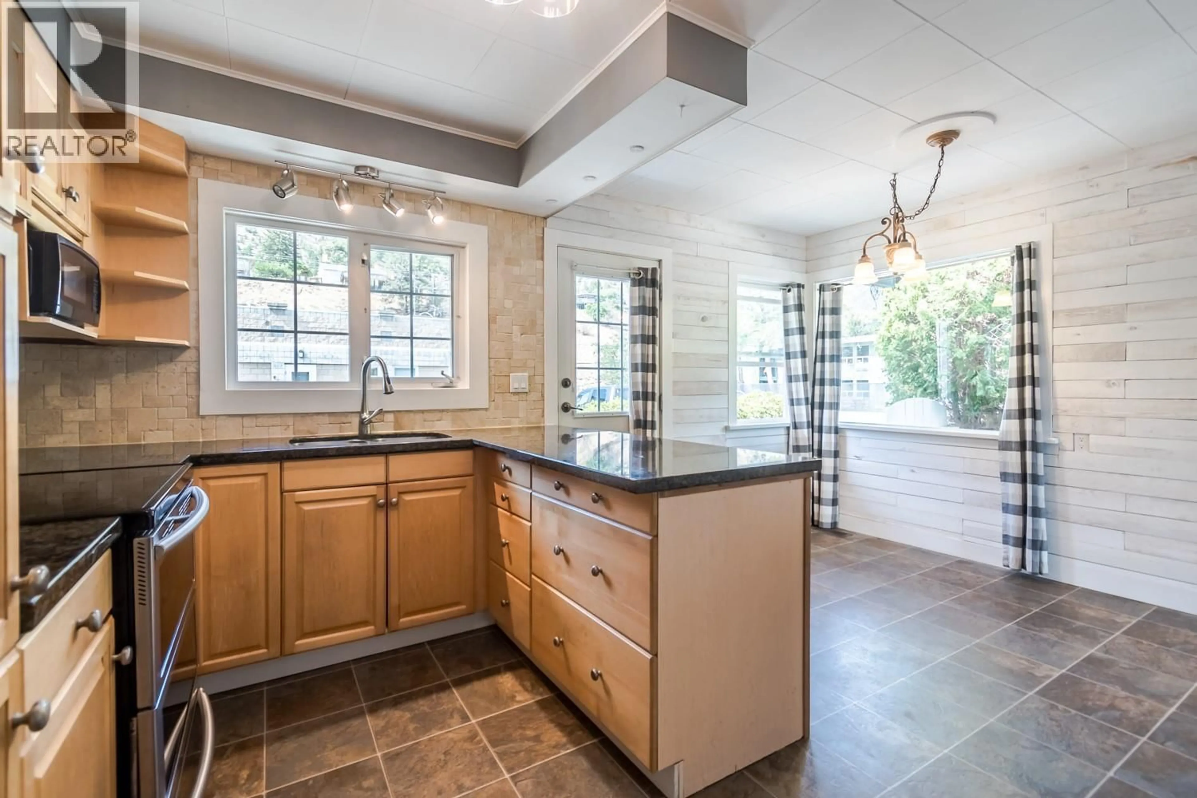 Open concept kitchen, ceramic/tile floor for 71 5TH AVENUE, Lillooet British Columbia V0K1V0