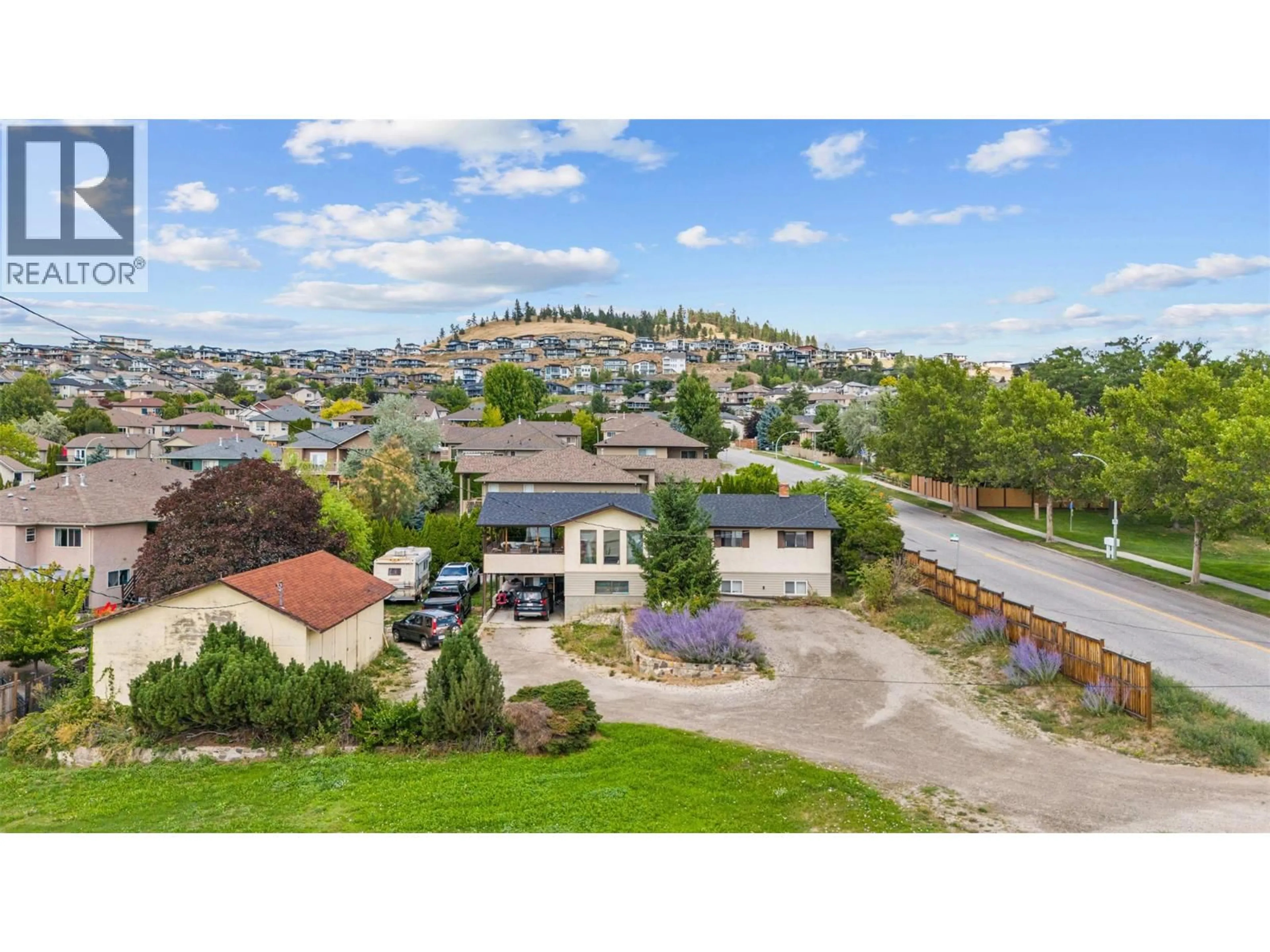 A pic from outside/outdoor area/front of a property/back of a property/a pic from drone, mountain view for 1584 HIGHWAY 33 OTHER EAST, Kelowna British Columbia V1P1L9