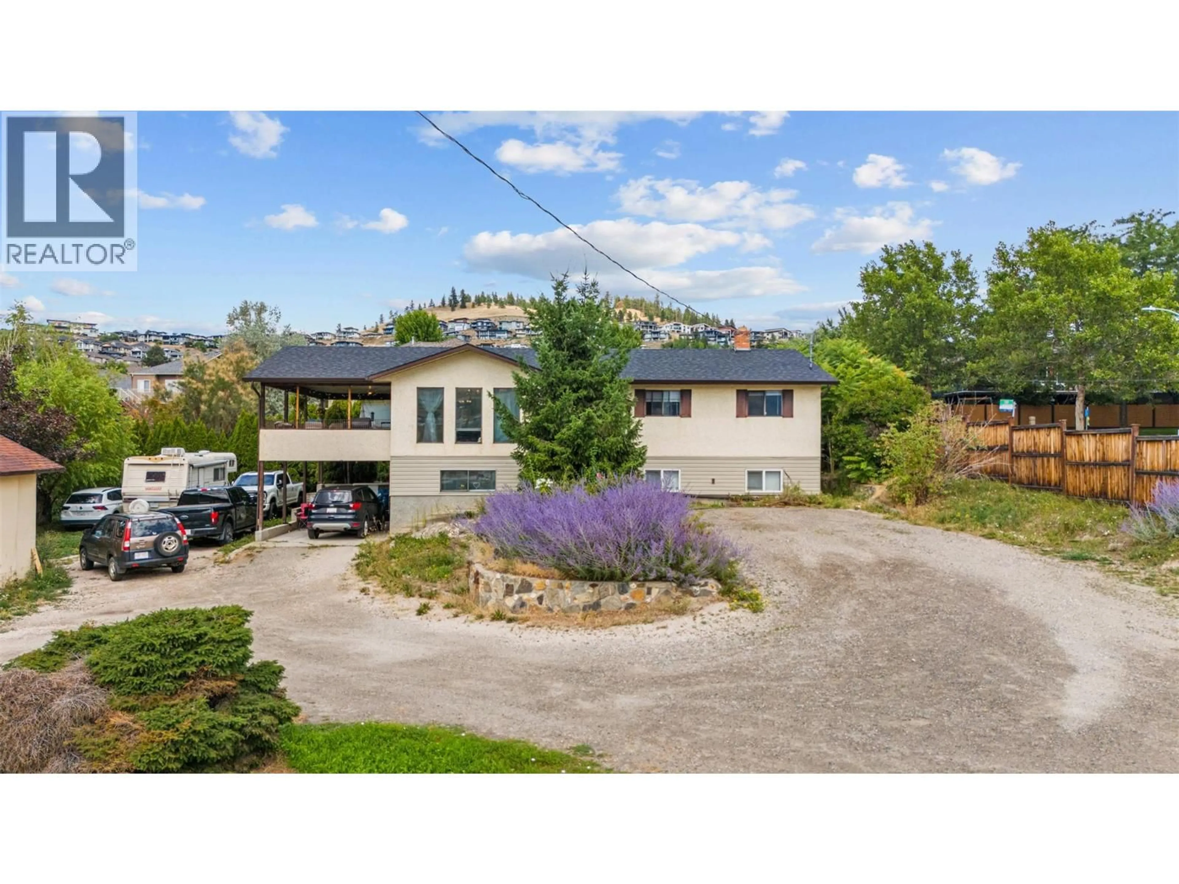 A pic from outside/outdoor area/front of a property/back of a property/a pic from drone, unknown for 1584 HIGHWAY 33 OTHER EAST, Kelowna British Columbia V1P1L9