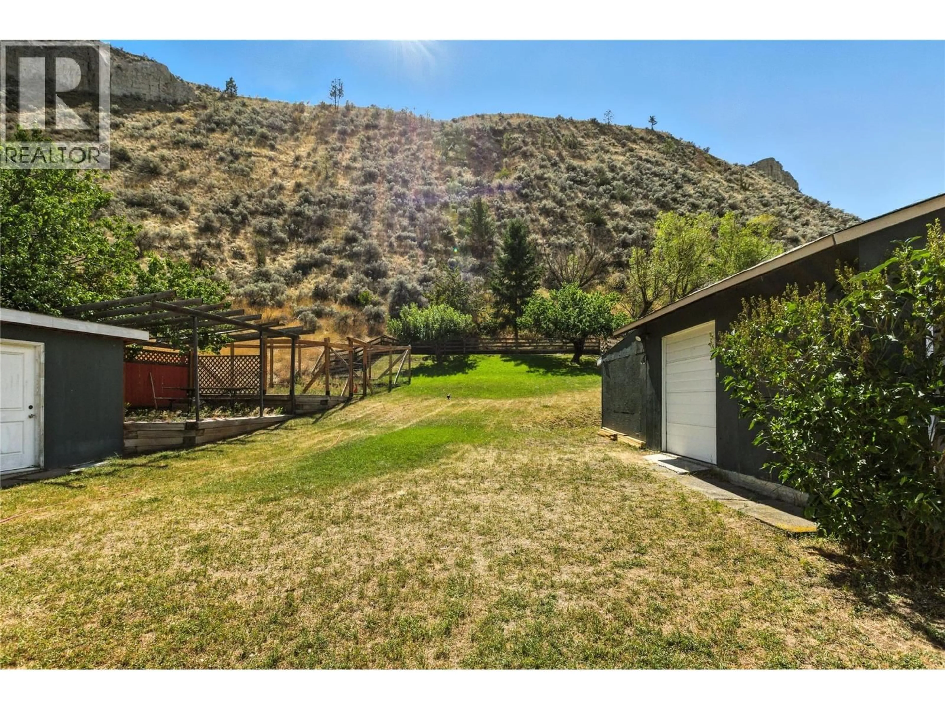A pic from outside/outdoor area/front of a property/back of a property/a pic from drone, mountain view for 2105 VALLEYVIEW DRIVE, Kamloops British Columbia V2C4C3