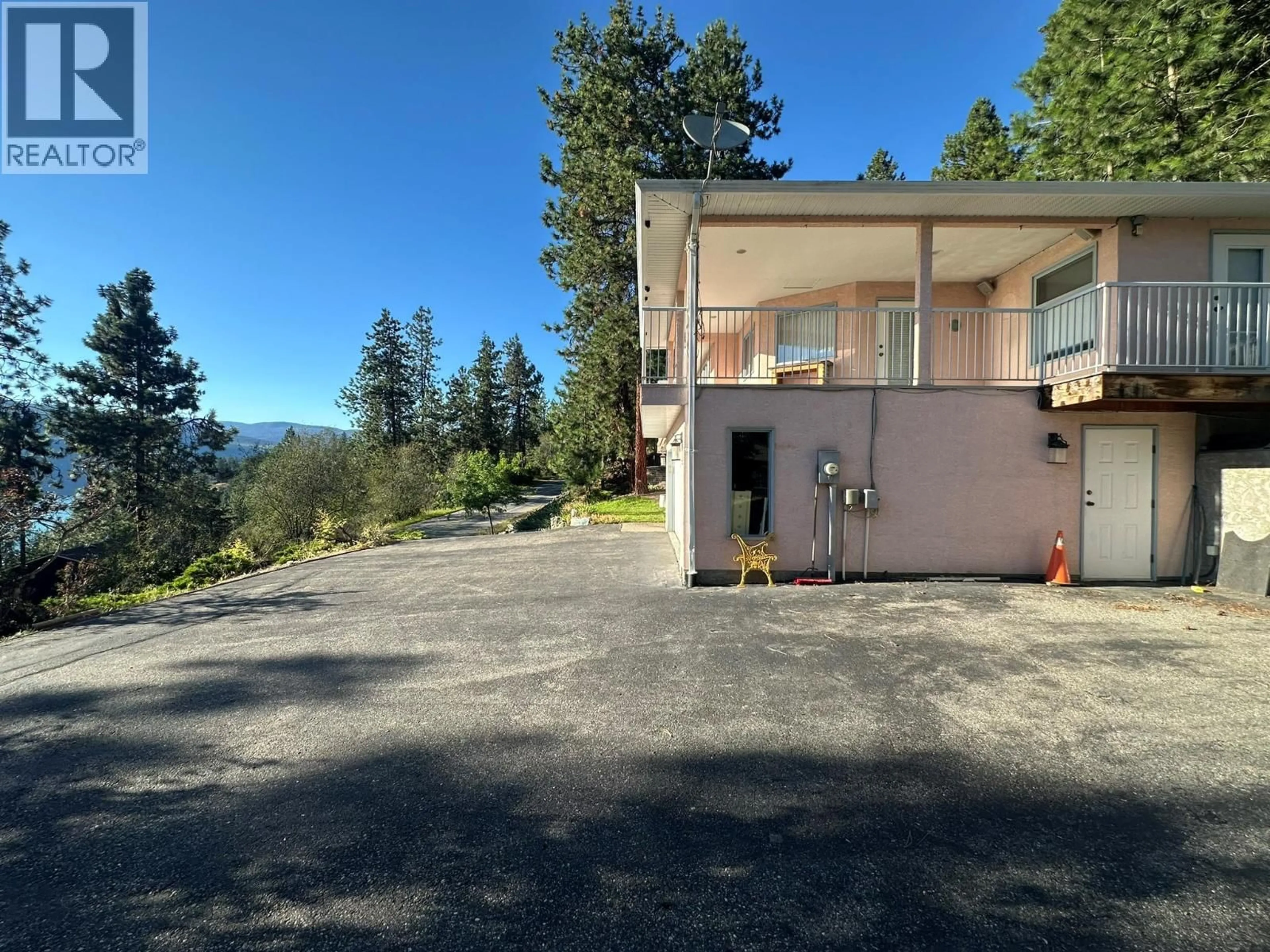 A pic from outside/outdoor area/front of a property/back of a property/a pic from drone, mountain view for 9085 TRONSON ROAD, Vernon British Columbia V1H1E2