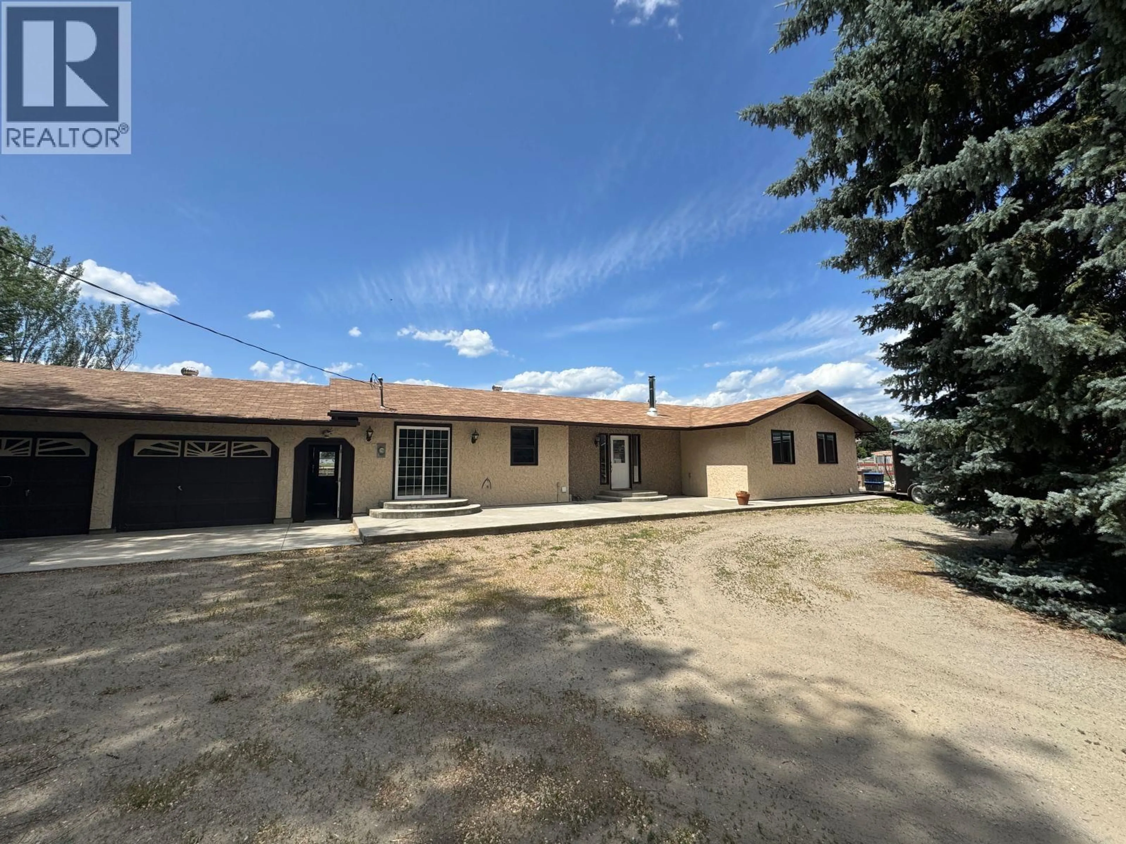 A pic from outside/outdoor area/front of a property/back of a property/a pic from drone, street for 5175 SIMINOFF ROAD, Grand Forks British Columbia V0H1H4