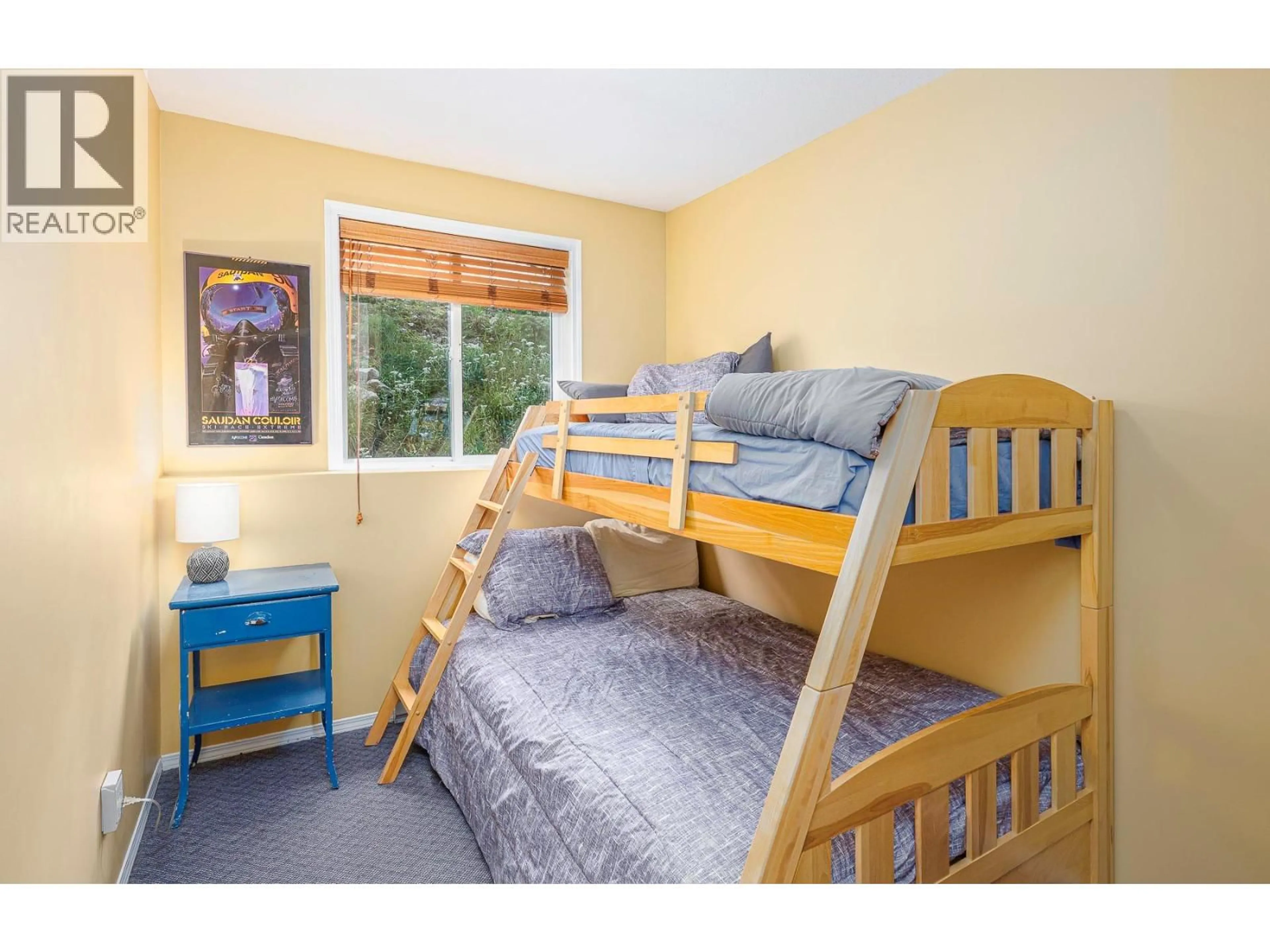 Bedroom with bed, wood/laminate floor for 102 - 225 KETTLEVIEW ROAD, Big White British Columbia V1P1T4