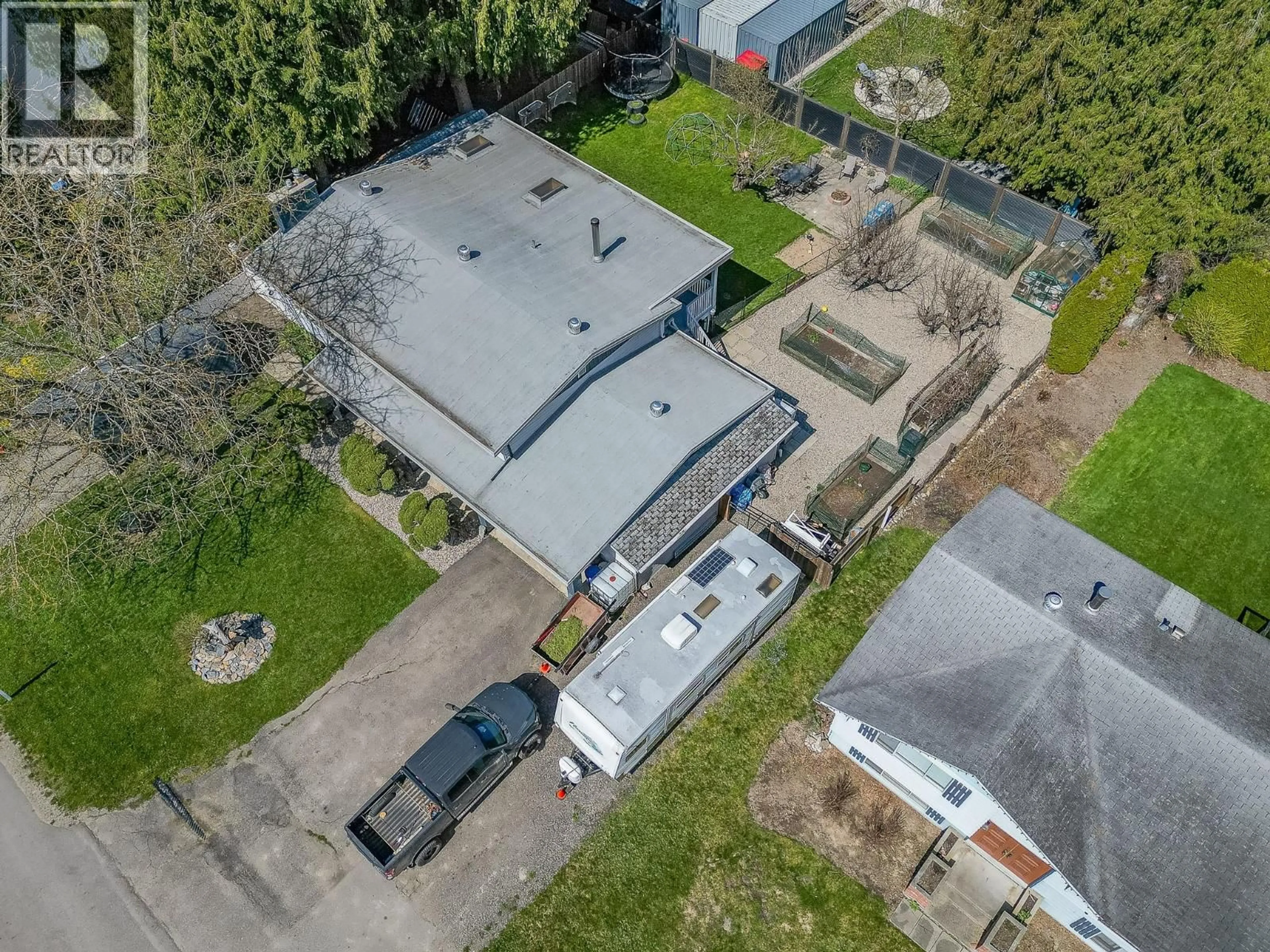 A pic from outside/outdoor area/front of a property/back of a property/a pic from drone, building for 714 MAPLE STREET, Sicamous British Columbia V0E2V1