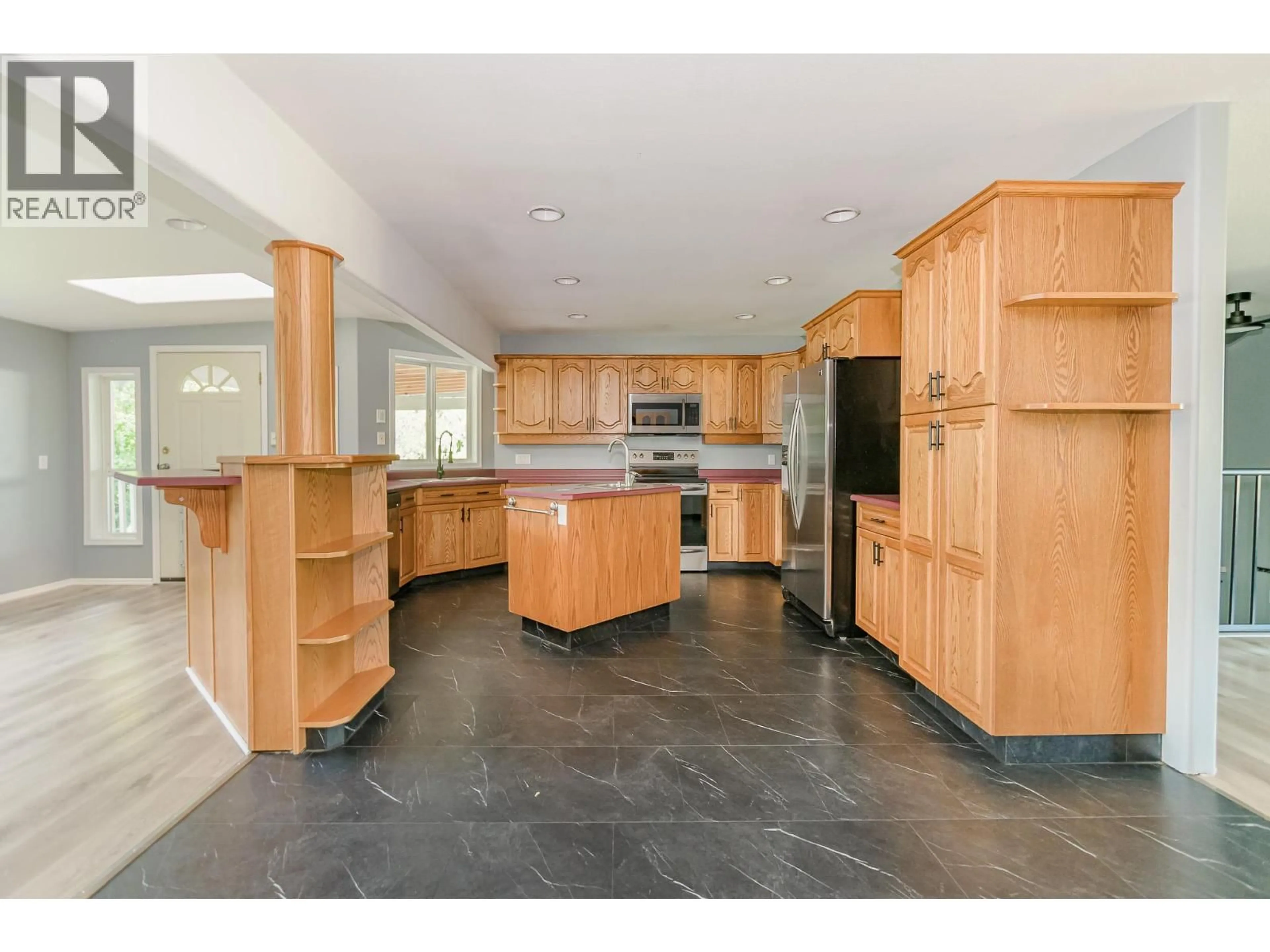 Open concept kitchen, ceramic/tile floor for 714 MAPLE STREET, Sicamous British Columbia V0E2V1