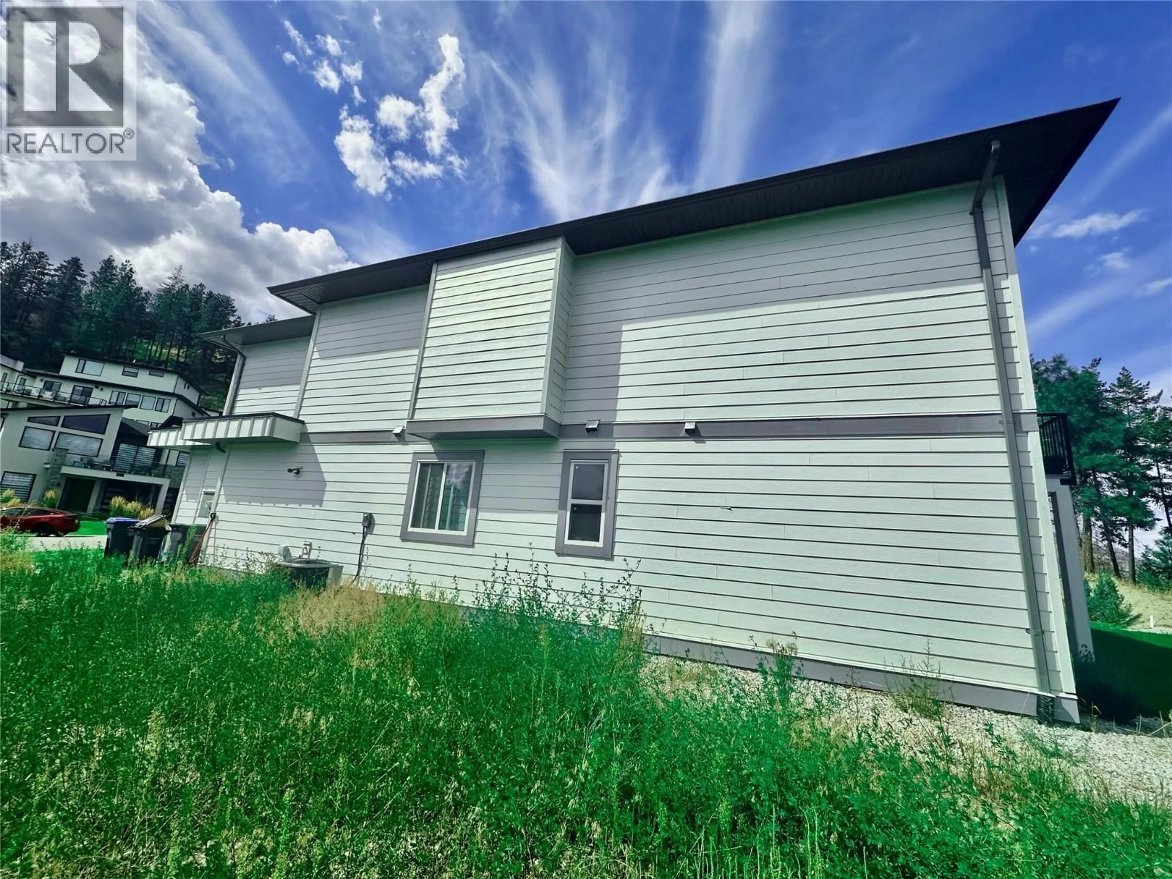 A pic from outside/outdoor area/front of a property/back of a property/a pic from drone, building for 18 - 830 WESTVIEW WAY, West Kelowna British Columbia V1Z3Z3