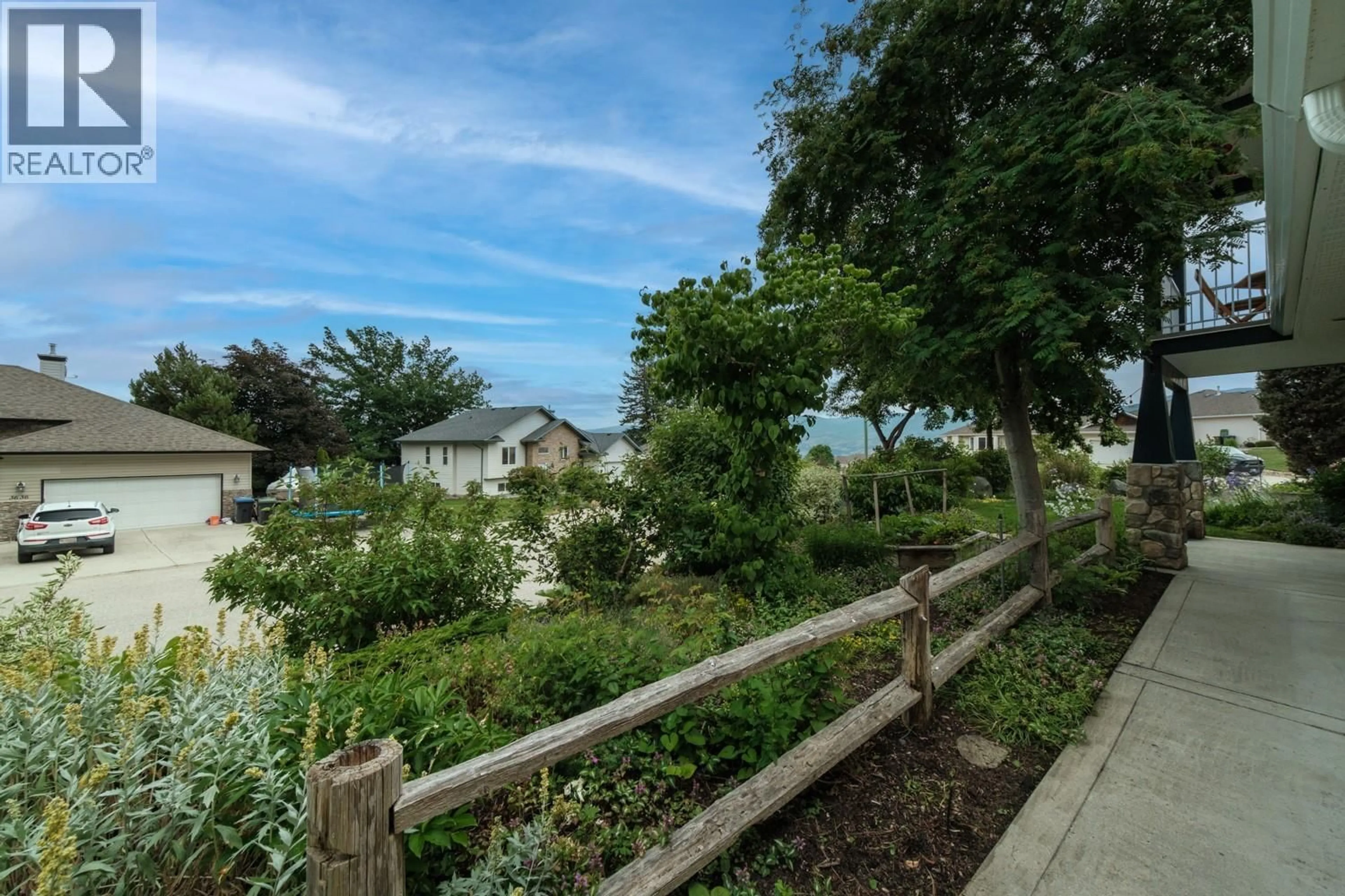 A pic from outside/outdoor area/front of a property/back of a property/a pic from drone, street for 3611 YORKTON ROAD, West Kelowna British Columbia V4T1C4