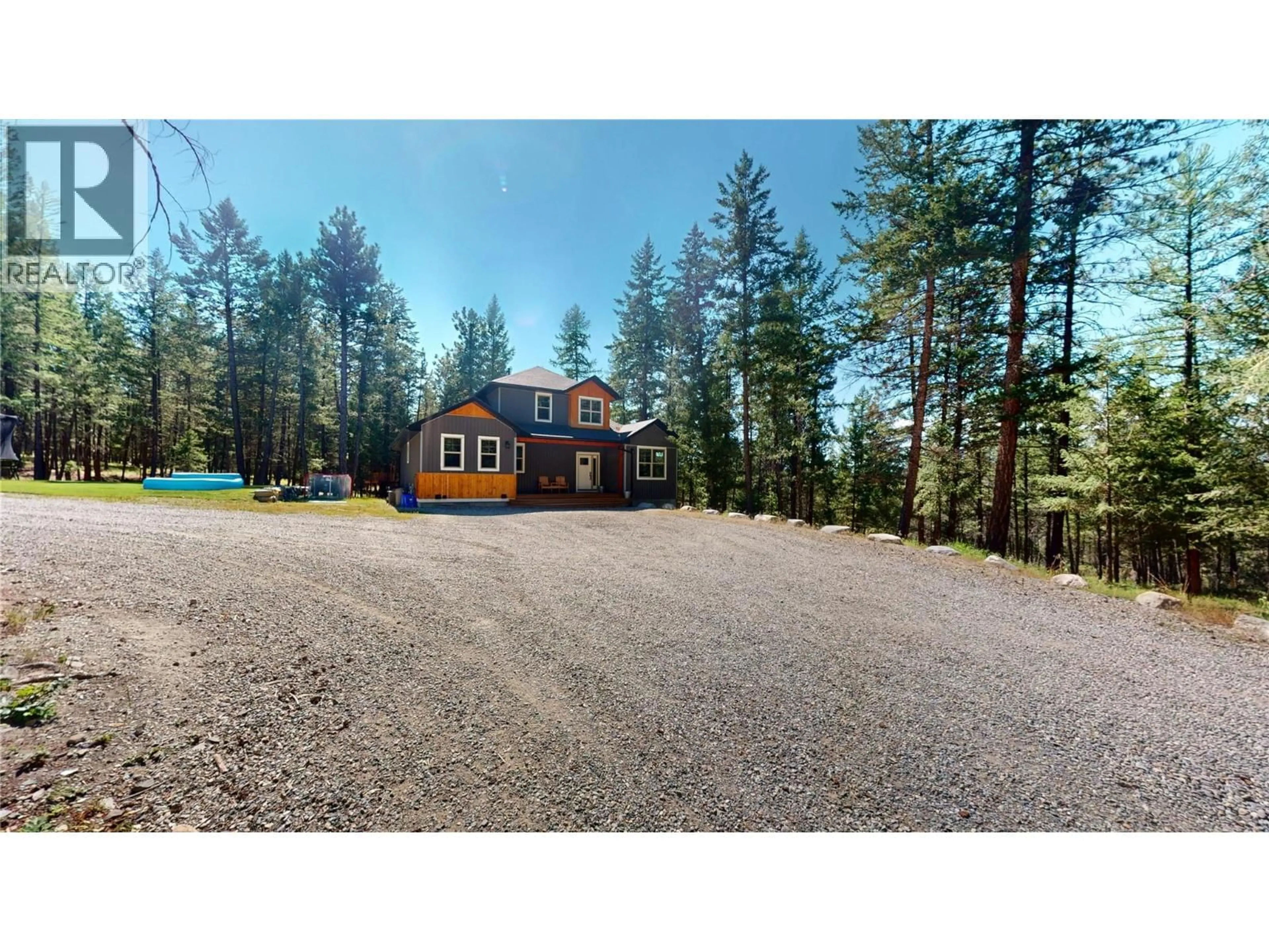 A pic from outside/outdoor area/front of a property/back of a property/a pic from drone, forest/trees view for 891 46TH AVENUE SOUTH, Cranbrook British Columbia V1C7A8