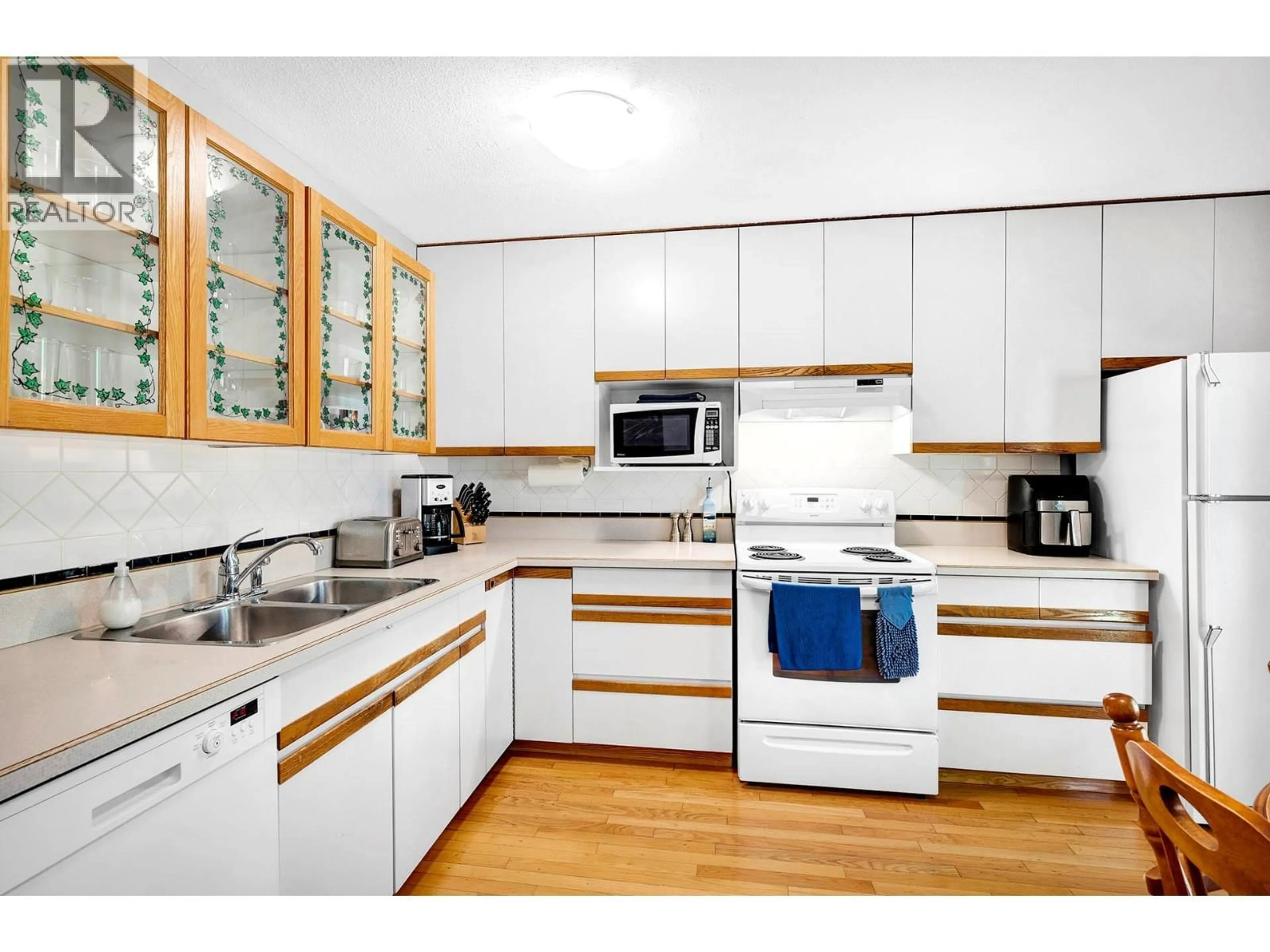 Standard kitchen, wood/laminate floor for 343 HELMCKEN STREET, Clearwater British Columbia V0E1N1