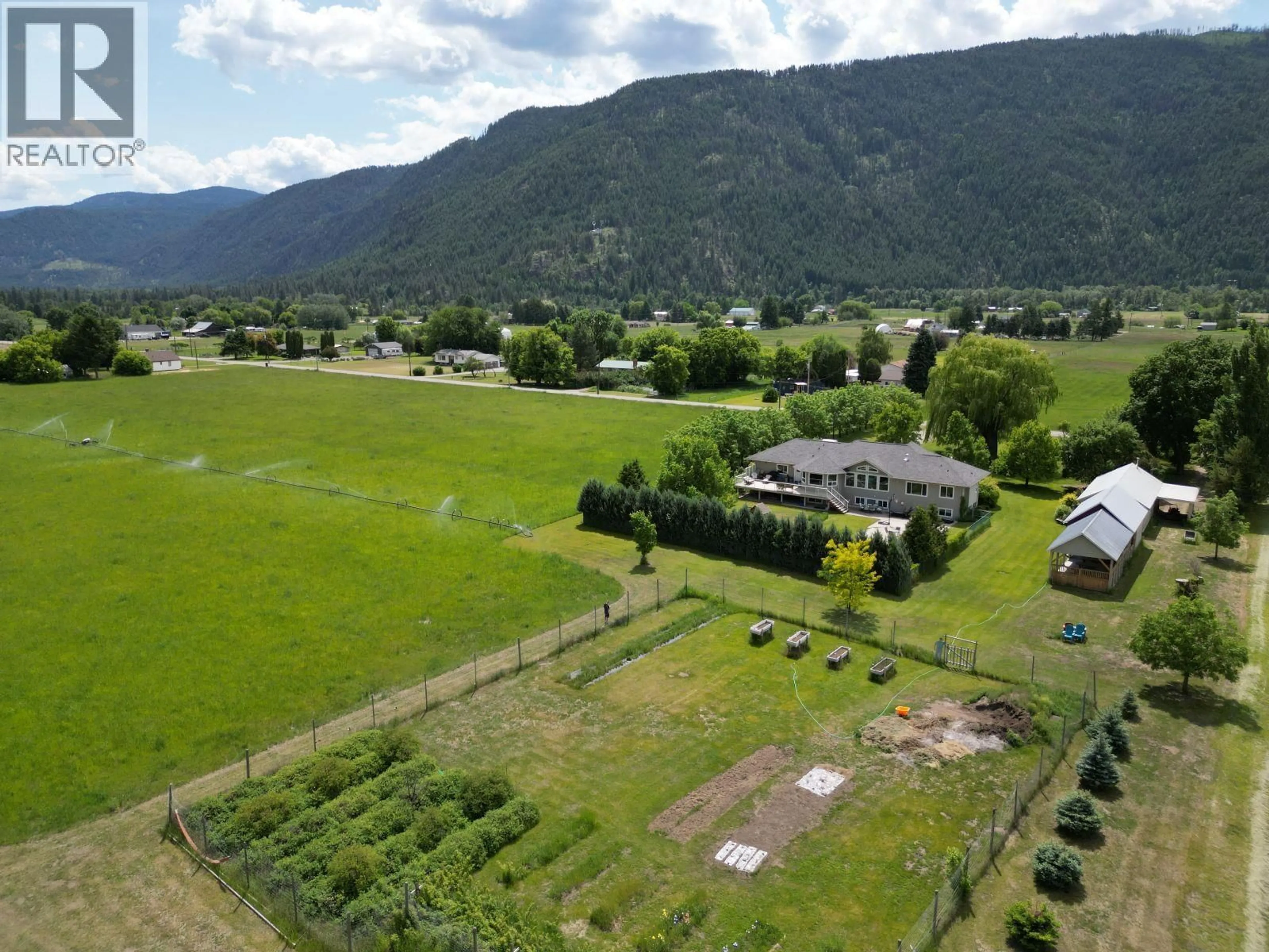 A pic from outside/outdoor area/front of a property/back of a property/a pic from drone, mountain view for 395 STARCHUCK ROAD, Grand Forks British Columbia V0H1H9