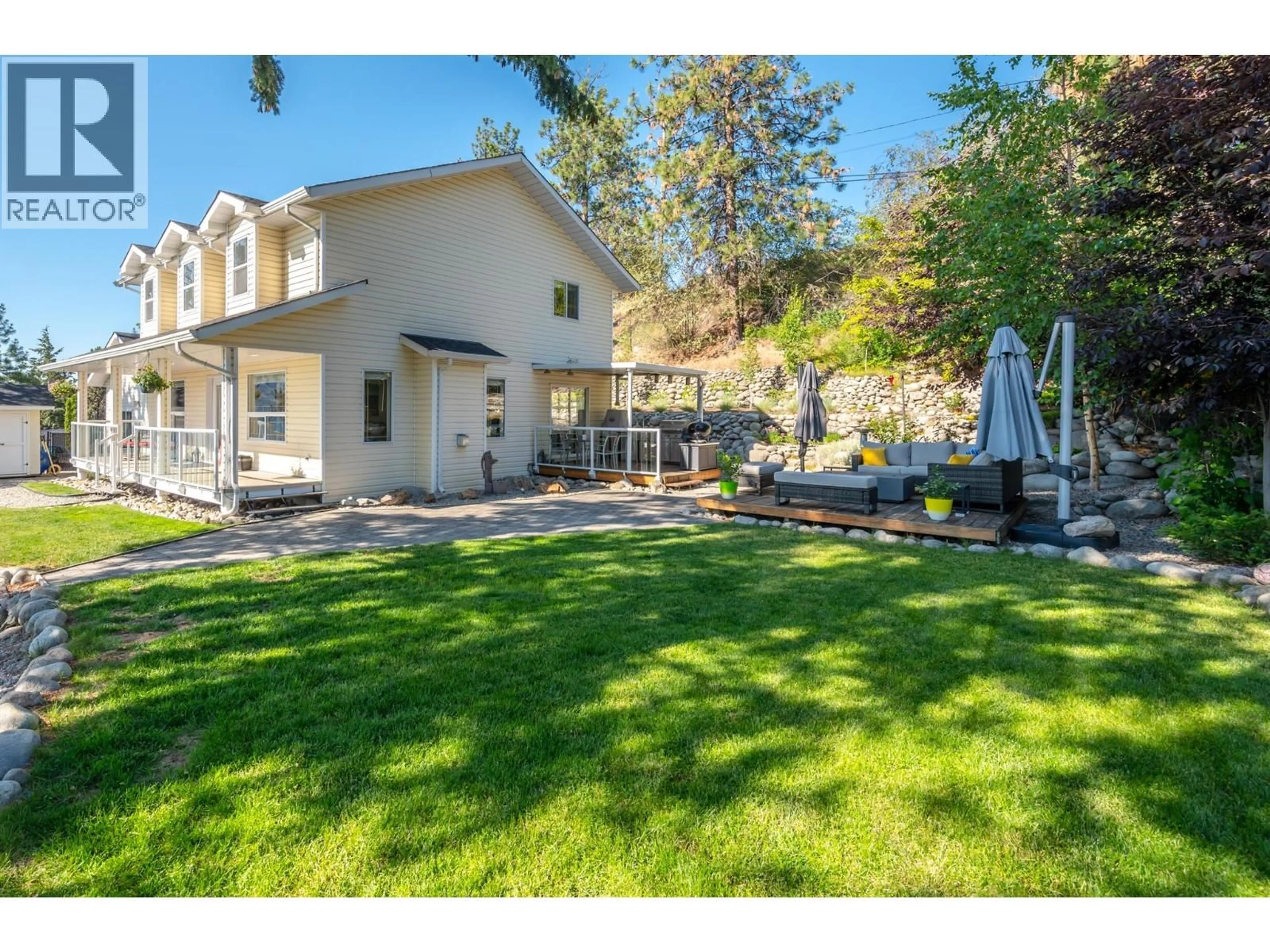 A pic from outside/outdoor area/front of a property/back of a property/a pic from drone, unknown for 4123 PONDEROSA DRIVE, Peachland British Columbia V0H1X5