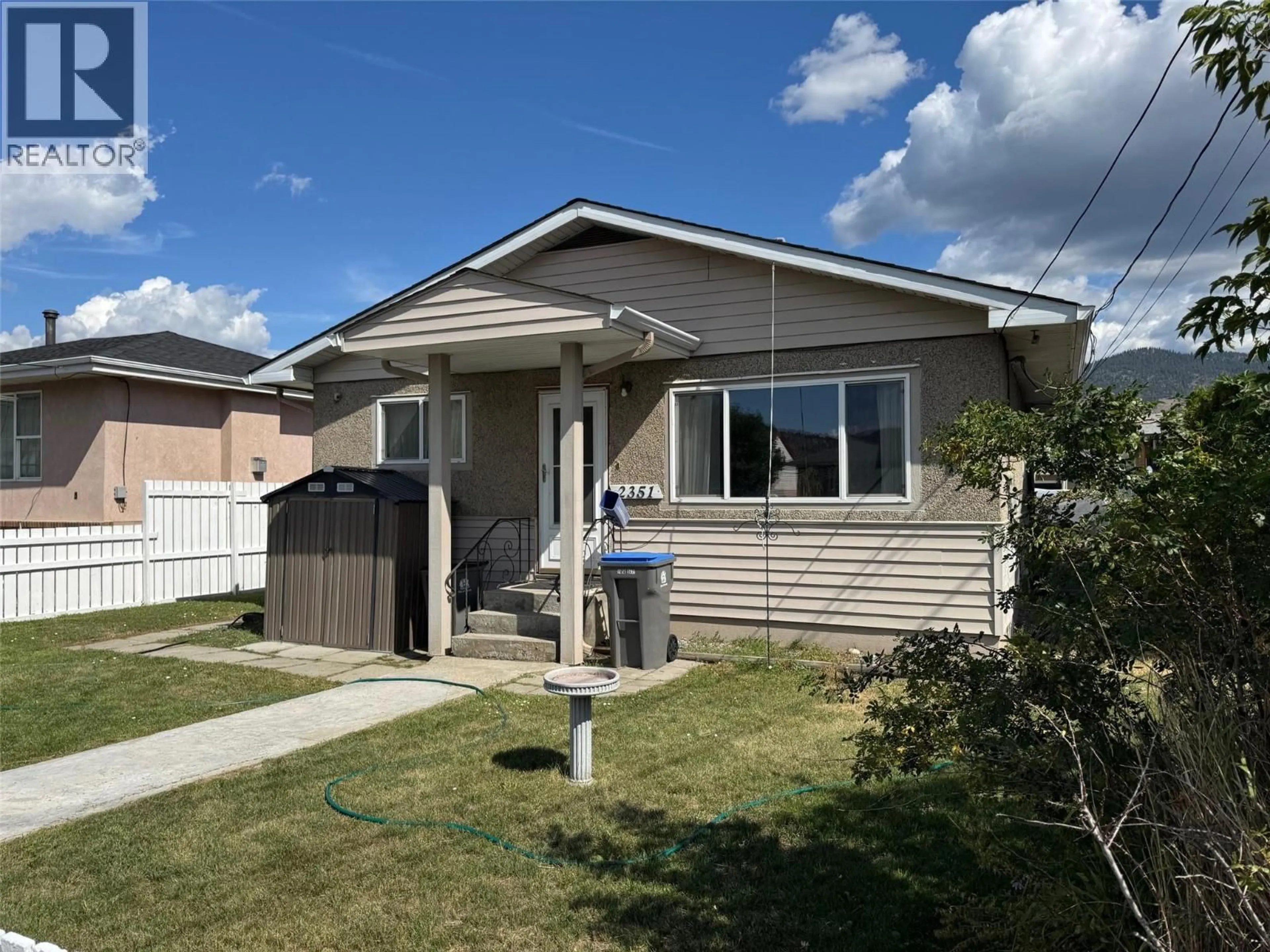 Home with vinyl exterior material, street for 2351 COUTLEE AVENUE, Merritt British Columbia V1K1B8