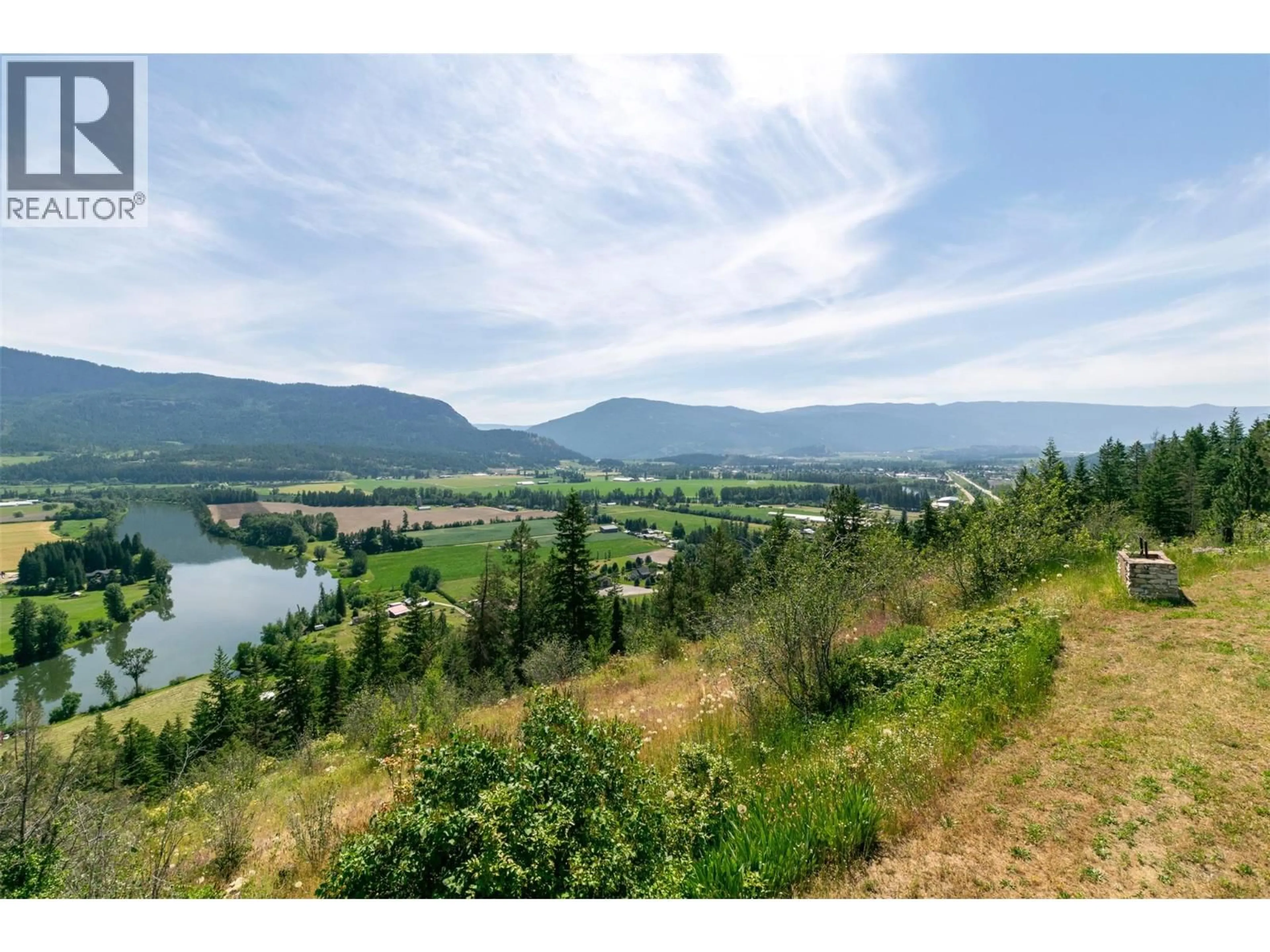 A pic from outside/outdoor area/front of a property/back of a property/a pic from drone, water/lake/river/ocean view for 137 NICHLOUS ROAD, Enderby British Columbia V4Y4G4