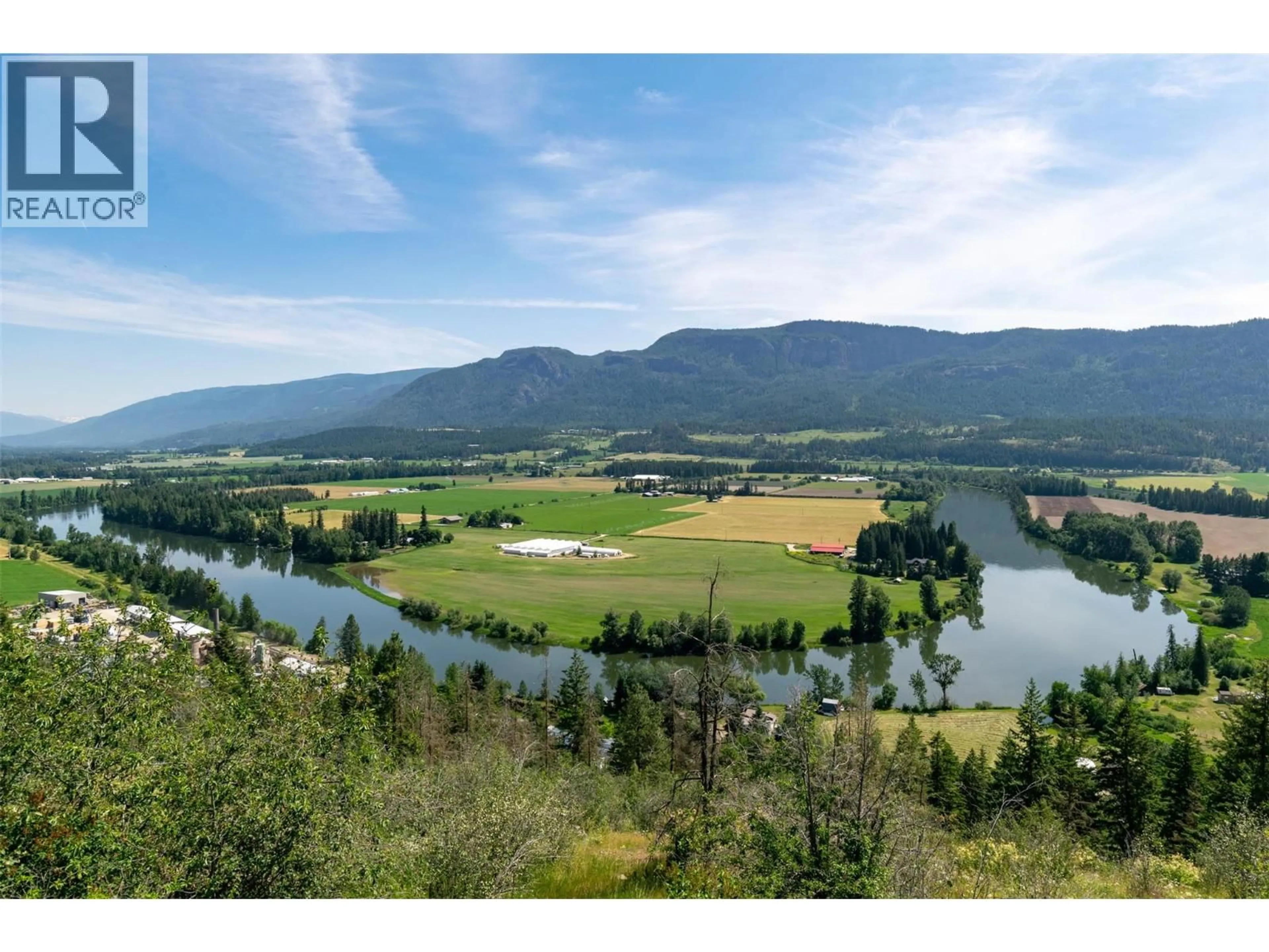 A pic from outside/outdoor area/front of a property/back of a property/a pic from drone, water/lake/river/ocean view for 137 NICHLOUS ROAD, Enderby British Columbia V4Y4G4
