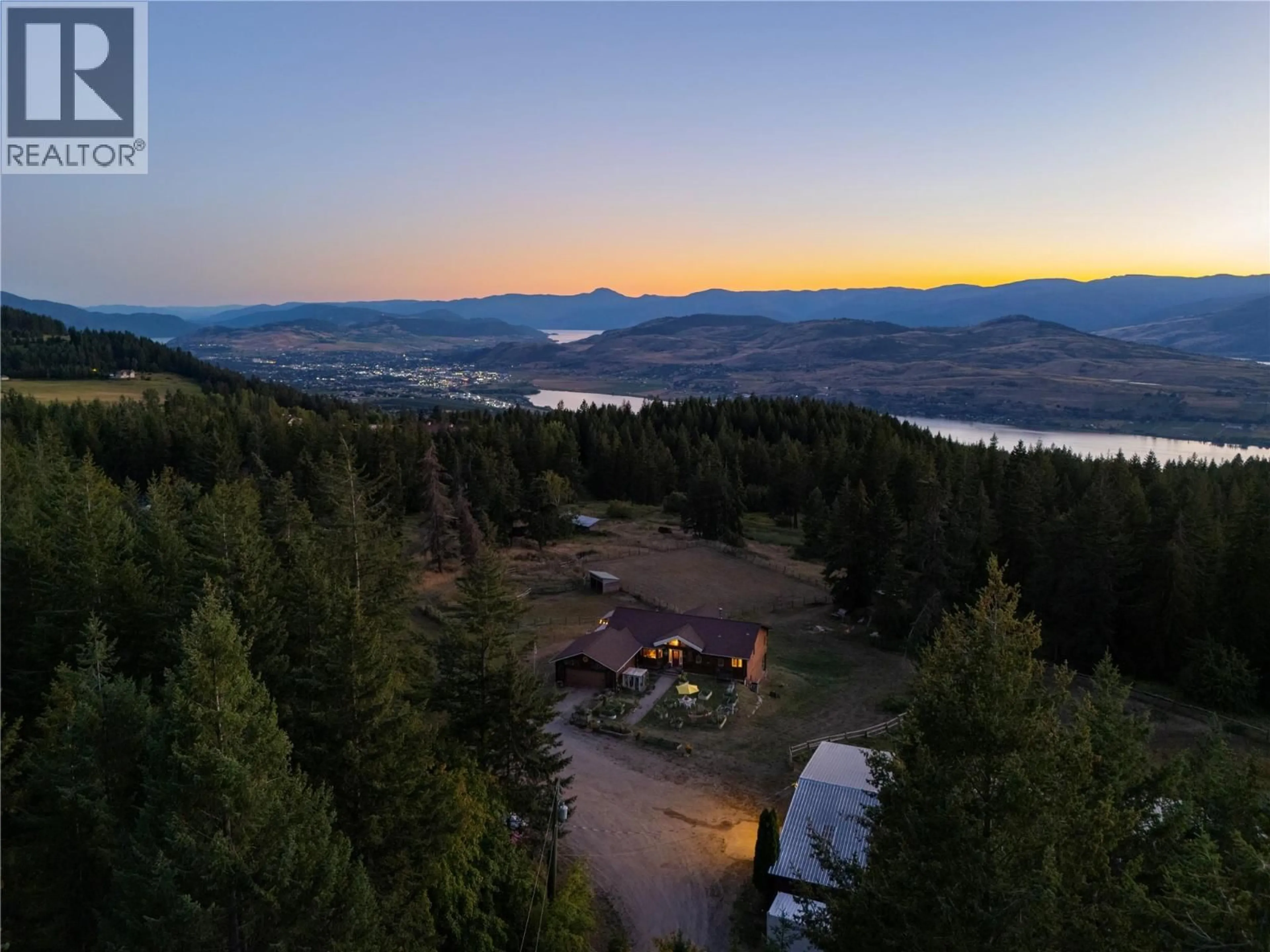A pic from outside/outdoor area/front of a property/back of a property/a pic from drone, mountain view for 7940 KEDDLESTON ROAD, Vernon British Columbia V1B3N4