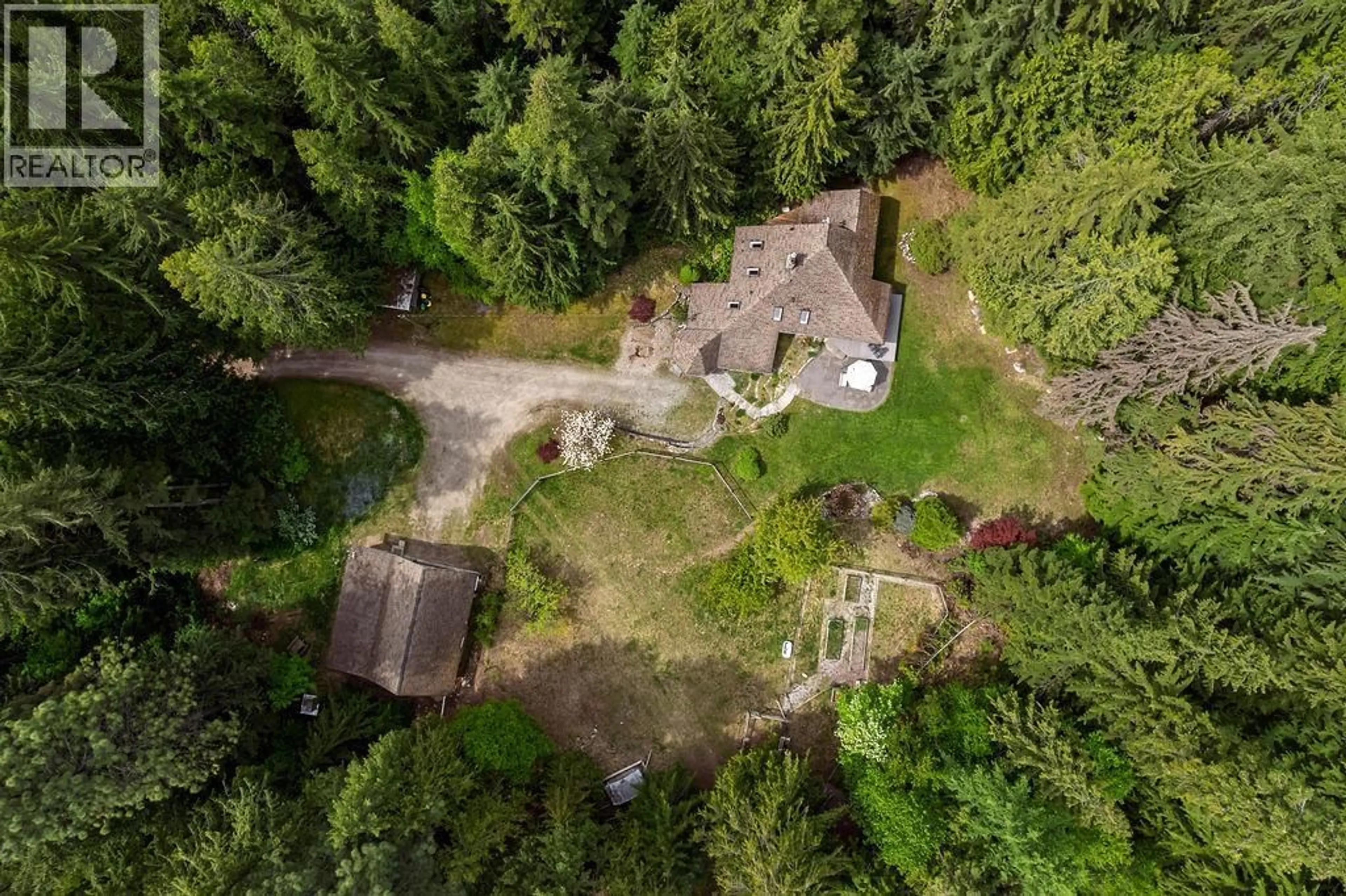 A pic from outside/outdoor area/front of a property/back of a property/a pic from drone, forest/trees view for 4225 3A HIGHWAY, Nelson British Columbia V1L6N1