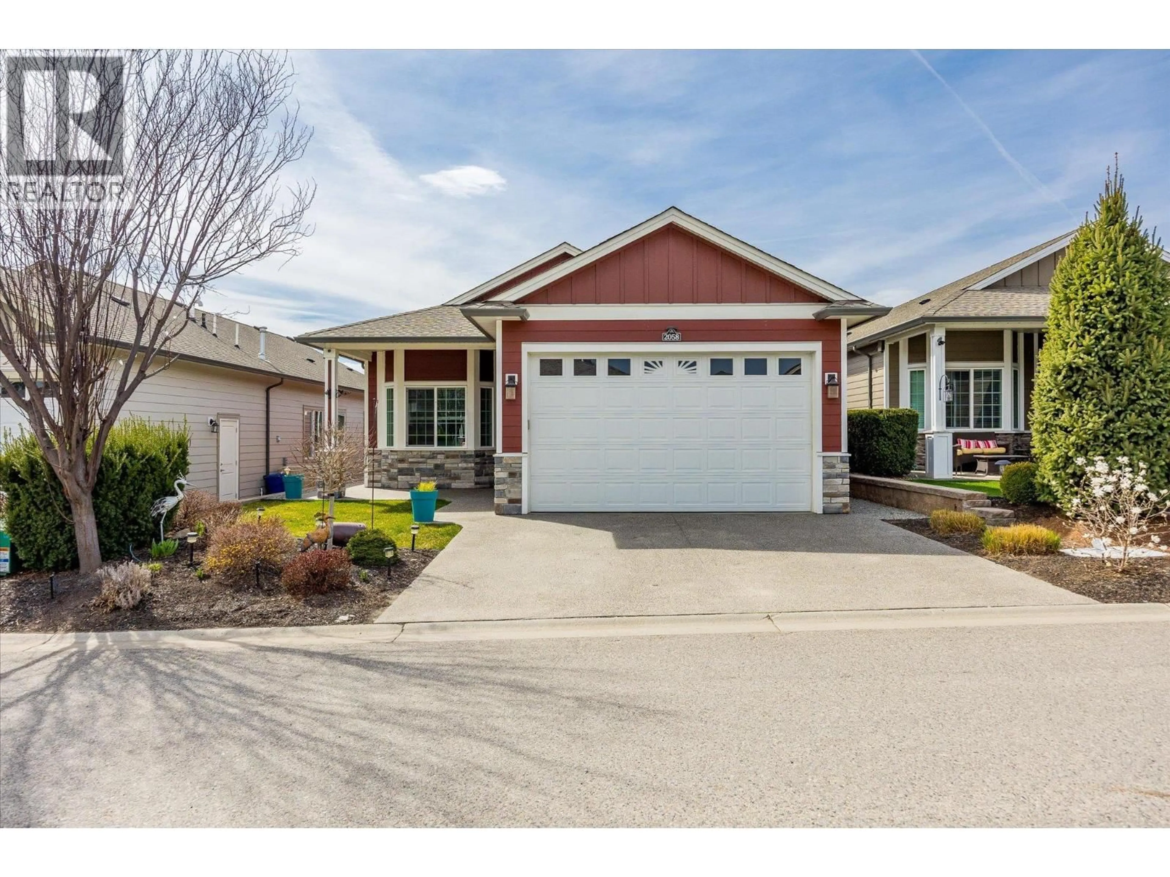 Home with vinyl exterior material, street for 2058 ASPEN DRIVE, West Kelowna British Columbia V4T3A5