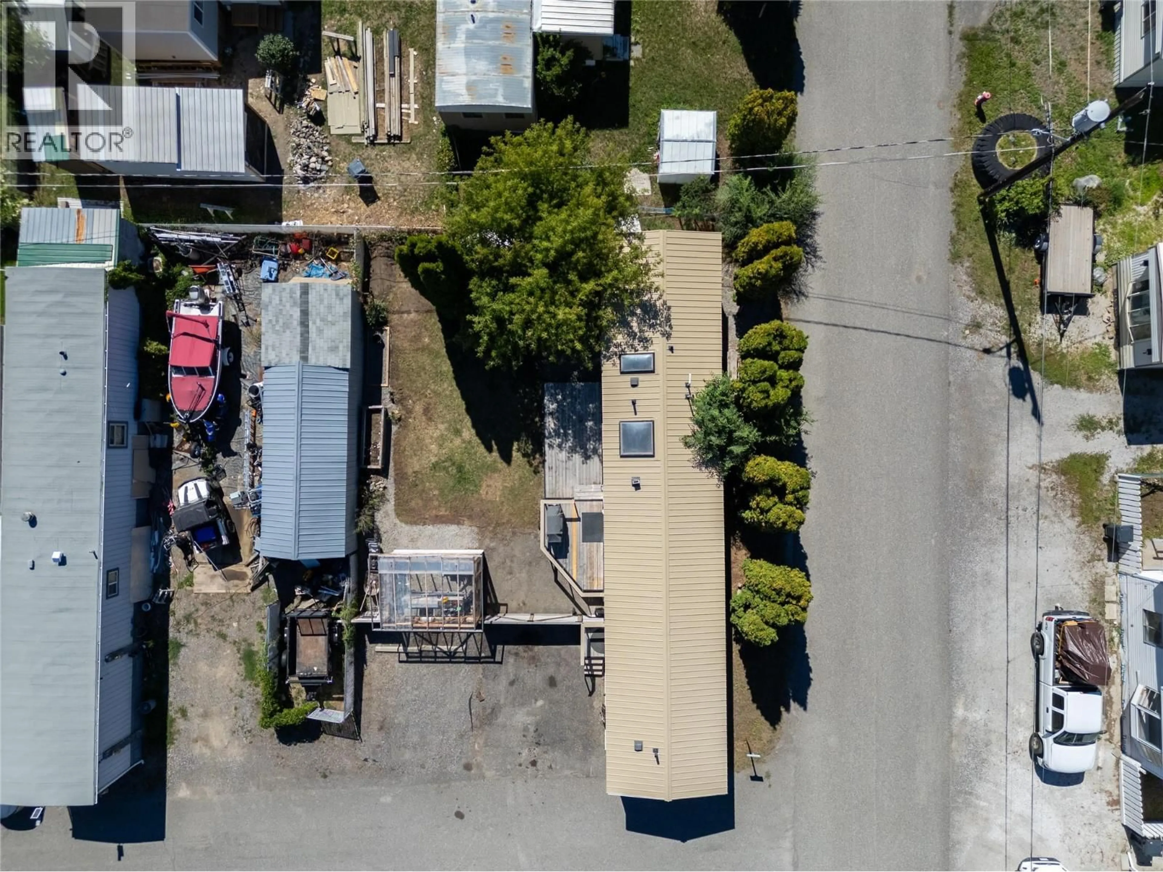 A pic from outside/outdoor area/front of a property/back of a property/a pic from drone, street for 18 - 701 TRANS CANADA HIGHWAY, Cache Creek British Columbia V0K1H0