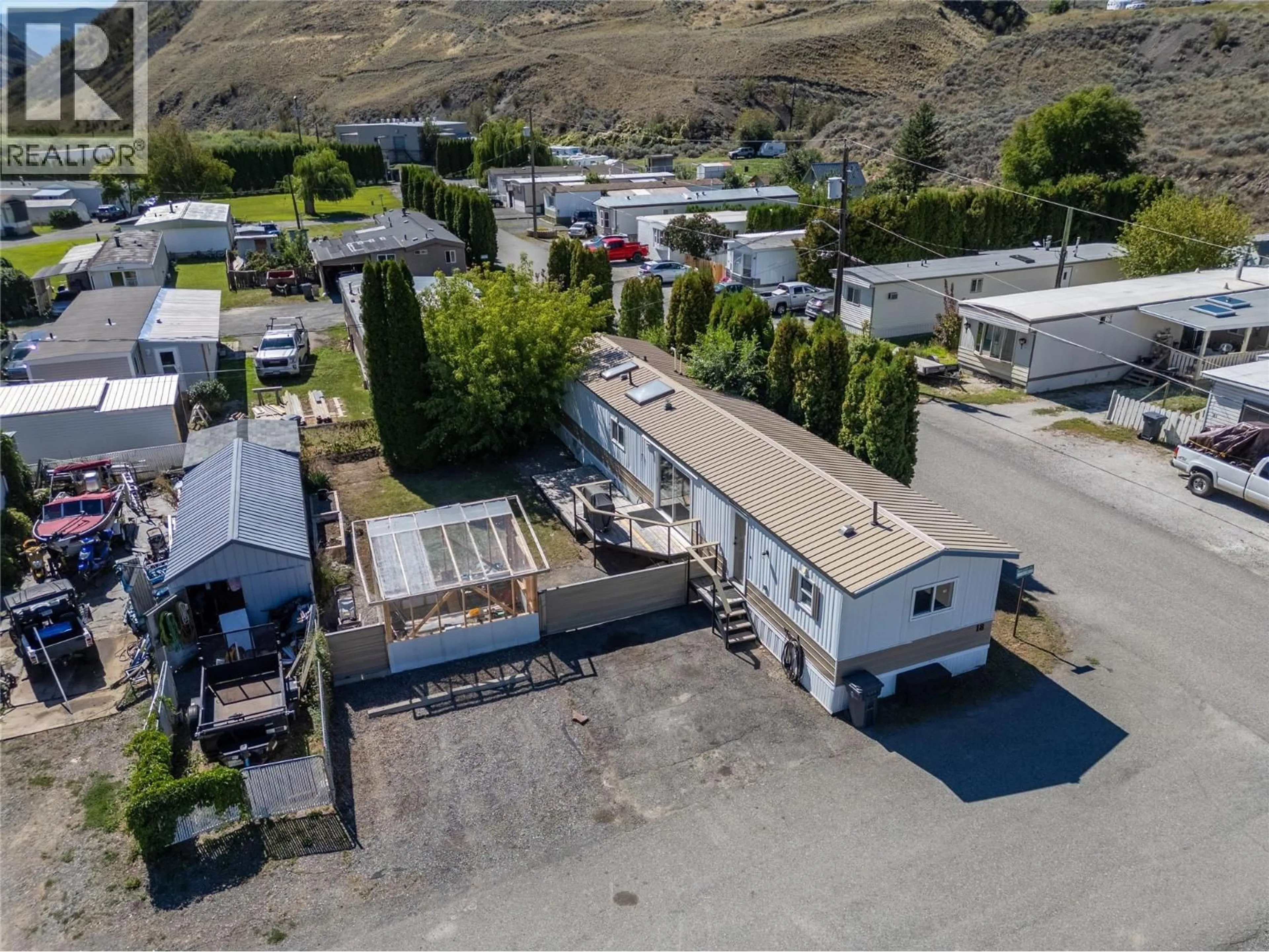 A pic from outside/outdoor area/front of a property/back of a property/a pic from drone, mountain view for 18 - 701 TRANS CANADA HIGHWAY, Cache Creek British Columbia V0K1H0