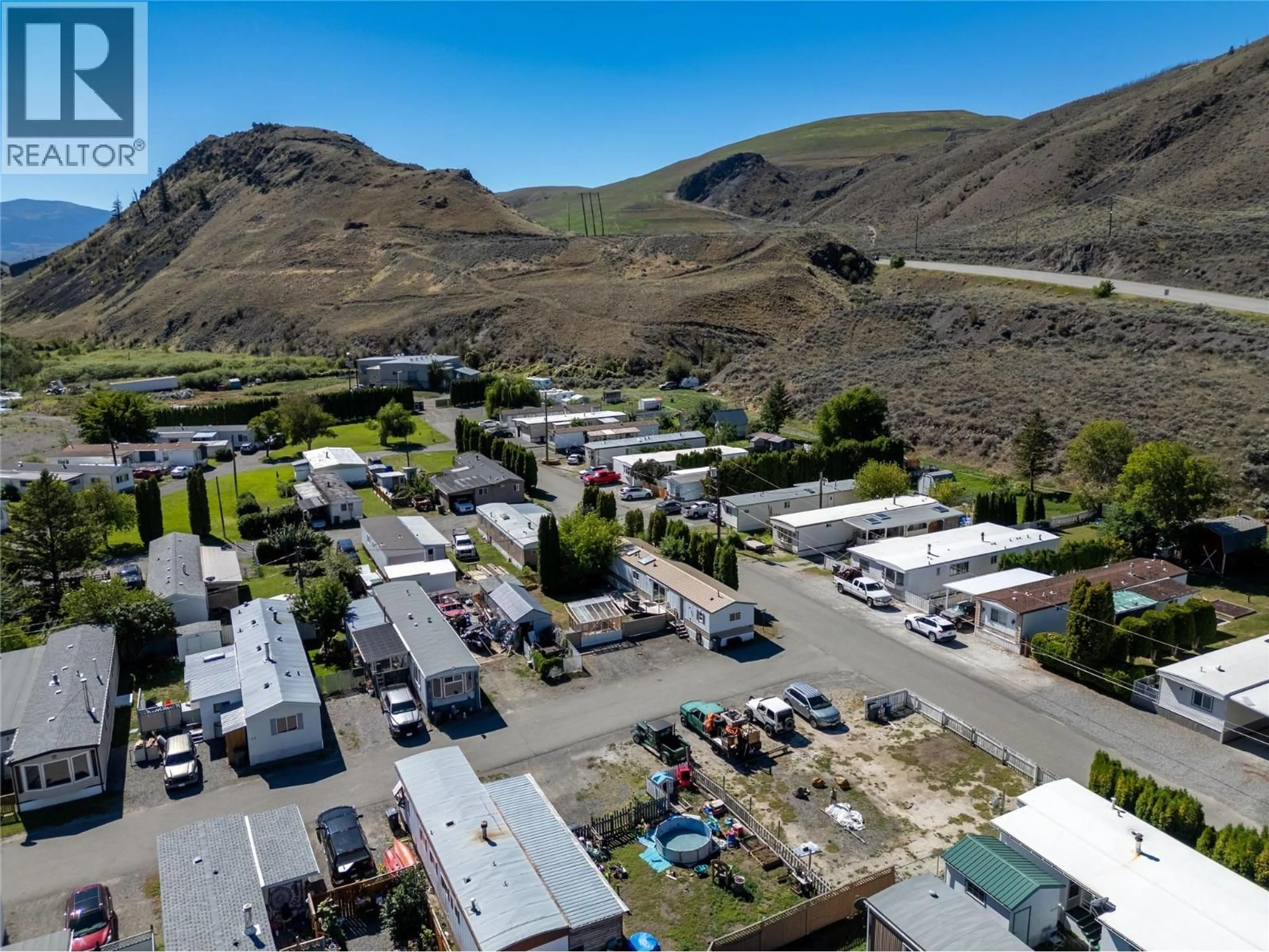 A pic from outside/outdoor area/front of a property/back of a property/a pic from drone, mountain view for 18 - 701 TRANS CANADA HIGHWAY, Cache Creek British Columbia V0K1H0