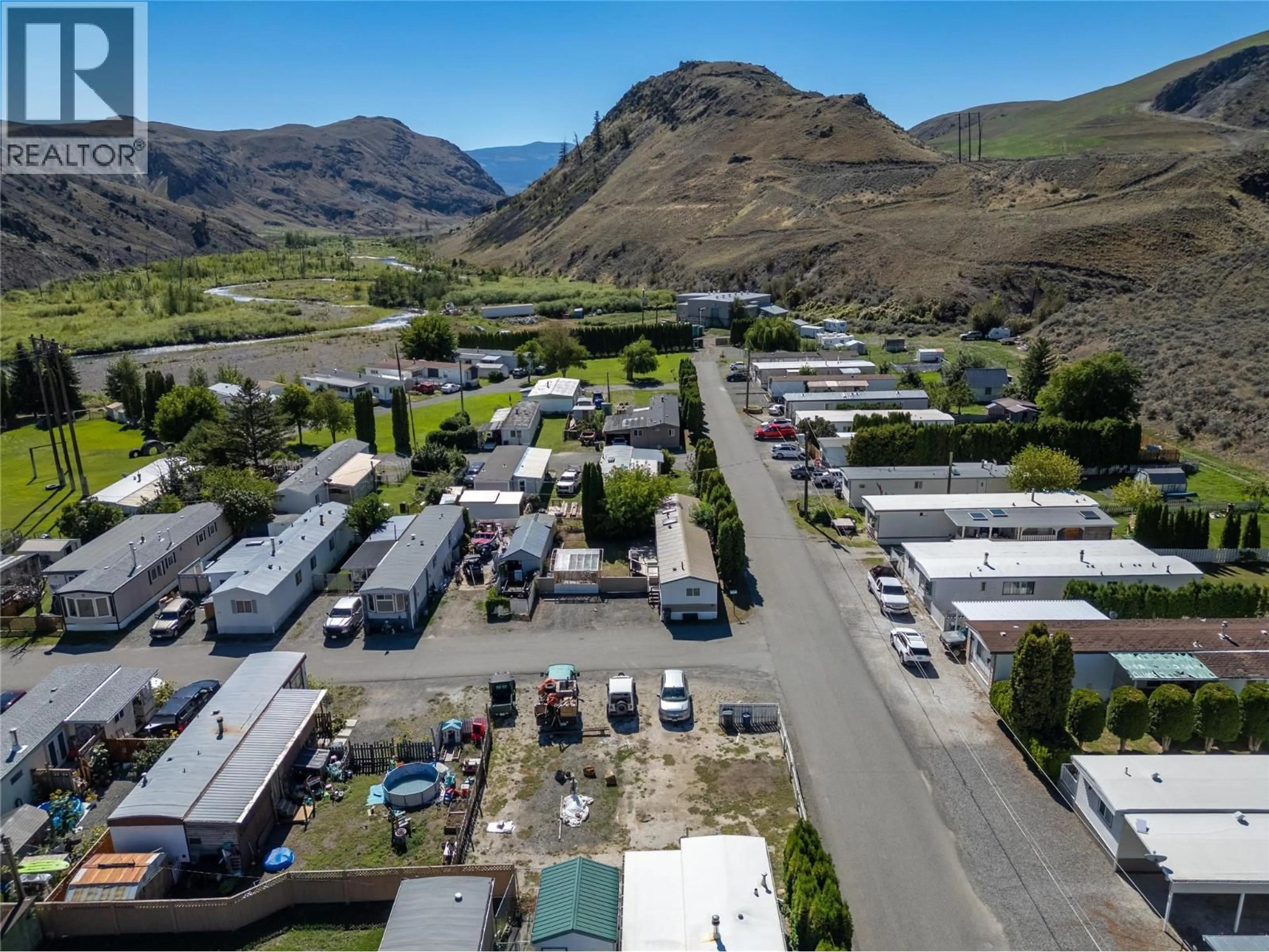 A pic from outside/outdoor area/front of a property/back of a property/a pic from drone, mountain view for 18 - 701 TRANS CANADA HIGHWAY, Cache Creek British Columbia V0K1H0