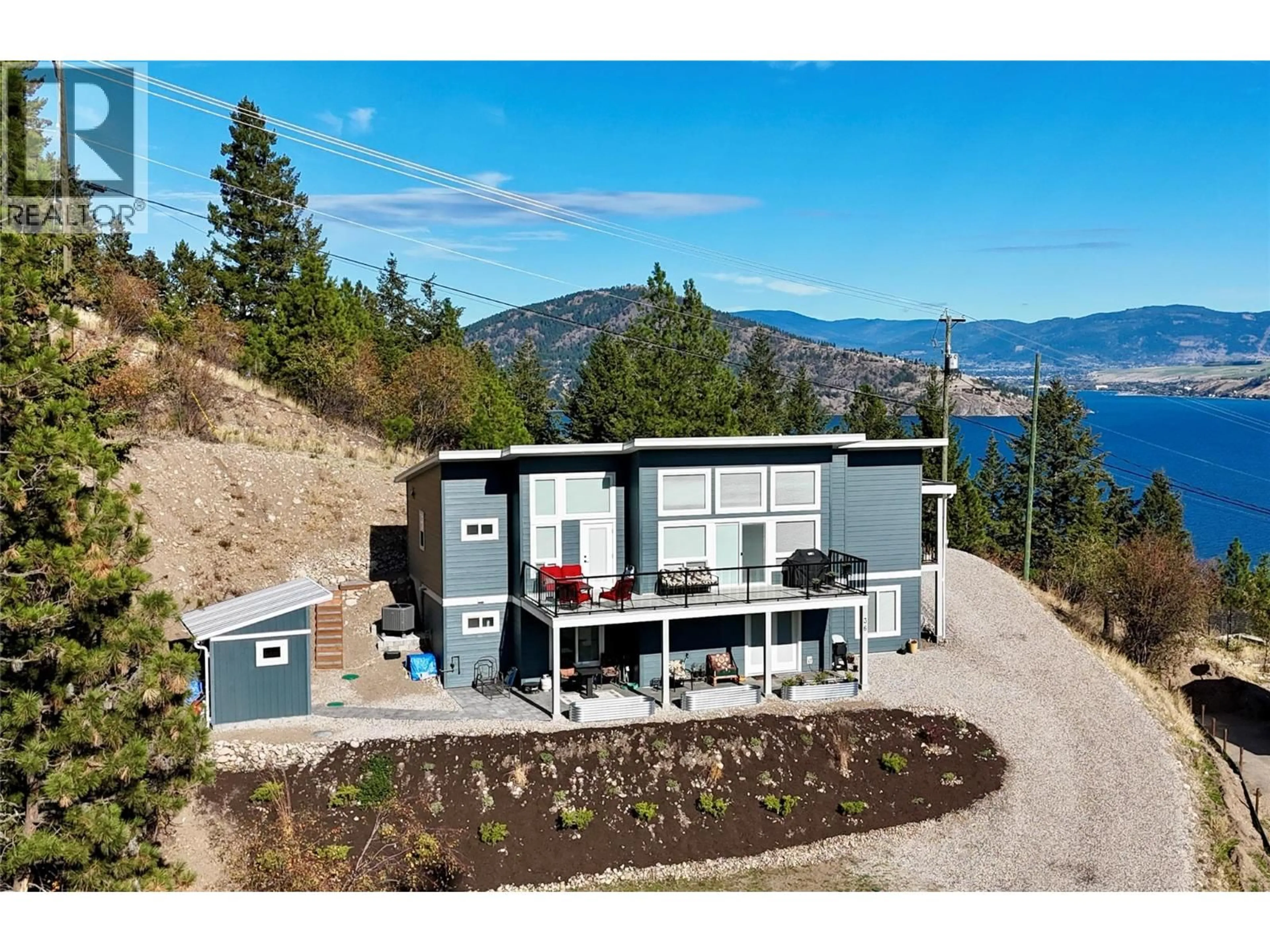 A pic from outside/outdoor area/front of a property/back of a property/a pic from drone, mountain view for 36 SPRUCE DRIVE, Vernon British Columbia V1H2V4