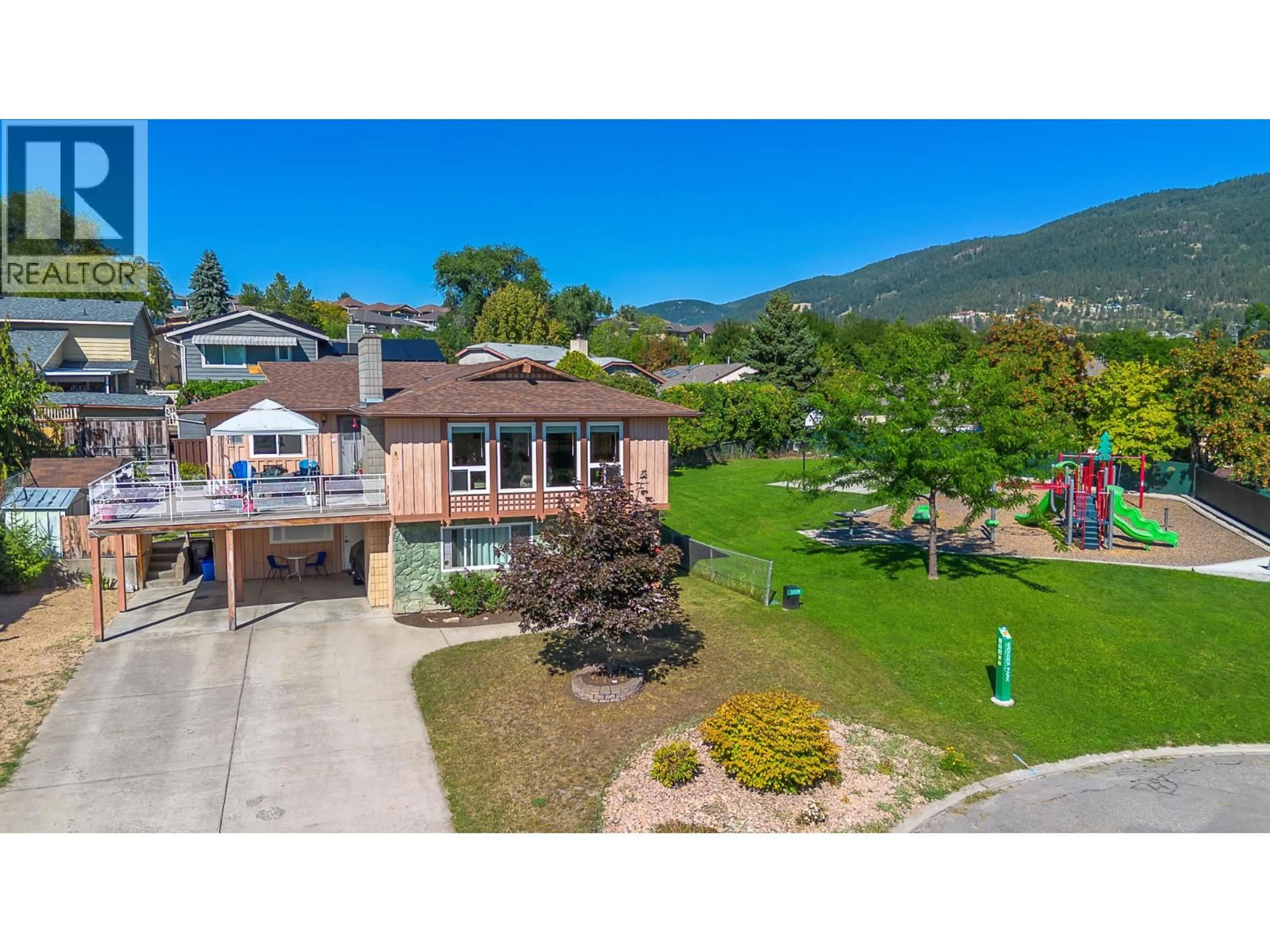 A pic from outside/outdoor area/front of a property/back of a property/a pic from drone, mountain view for 3011 11 STREET, Vernon British Columbia V1T7V1