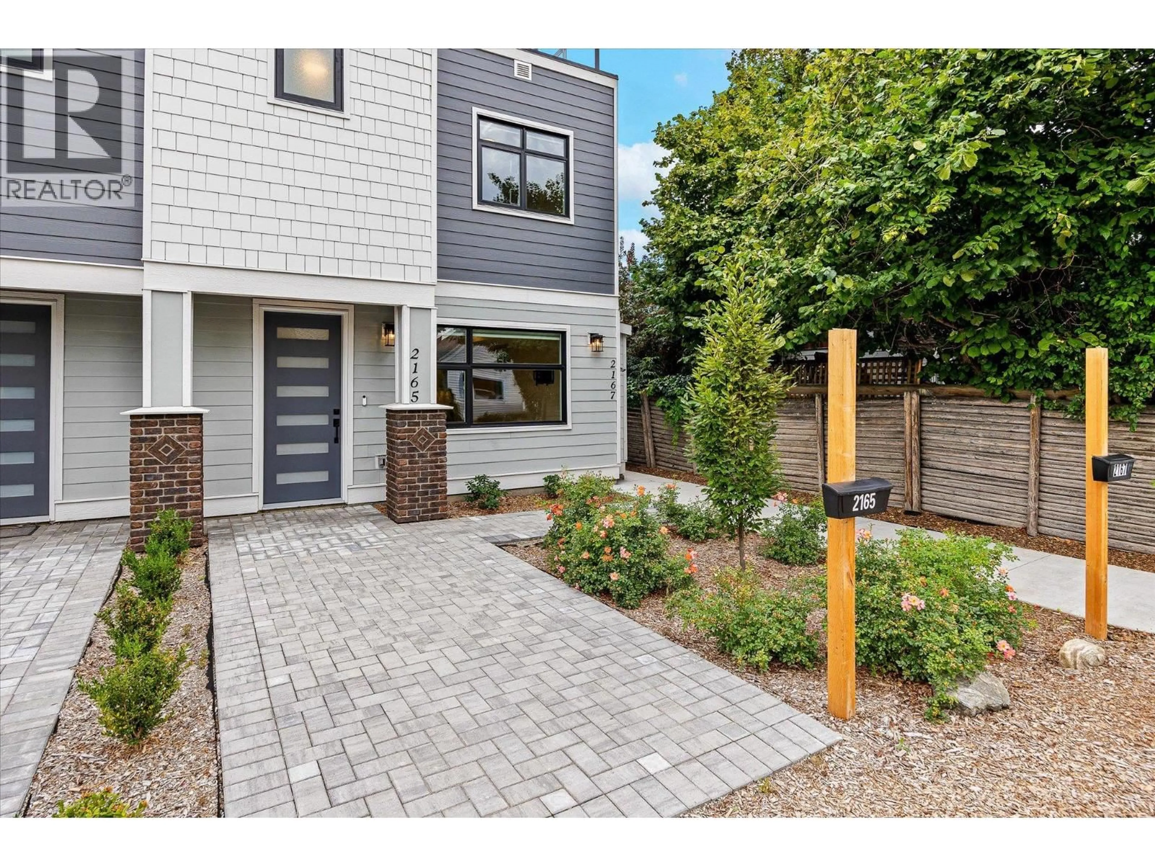 Home with brick exterior material, street for 2165 WOODLAWN STREET, Kelowna British Columbia V1Y2T1