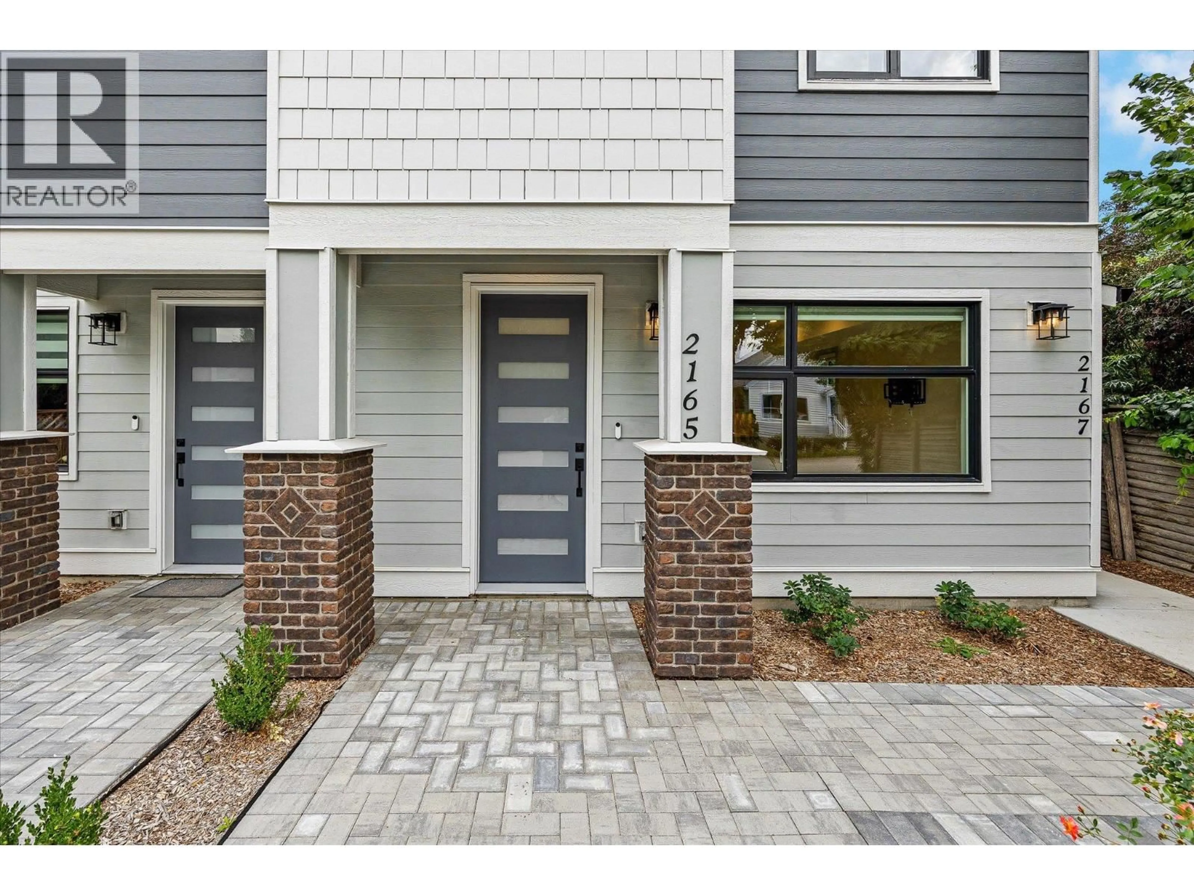 Home with brick exterior material, street for 2165 WOODLAWN STREET, Kelowna British Columbia V1Y2T1