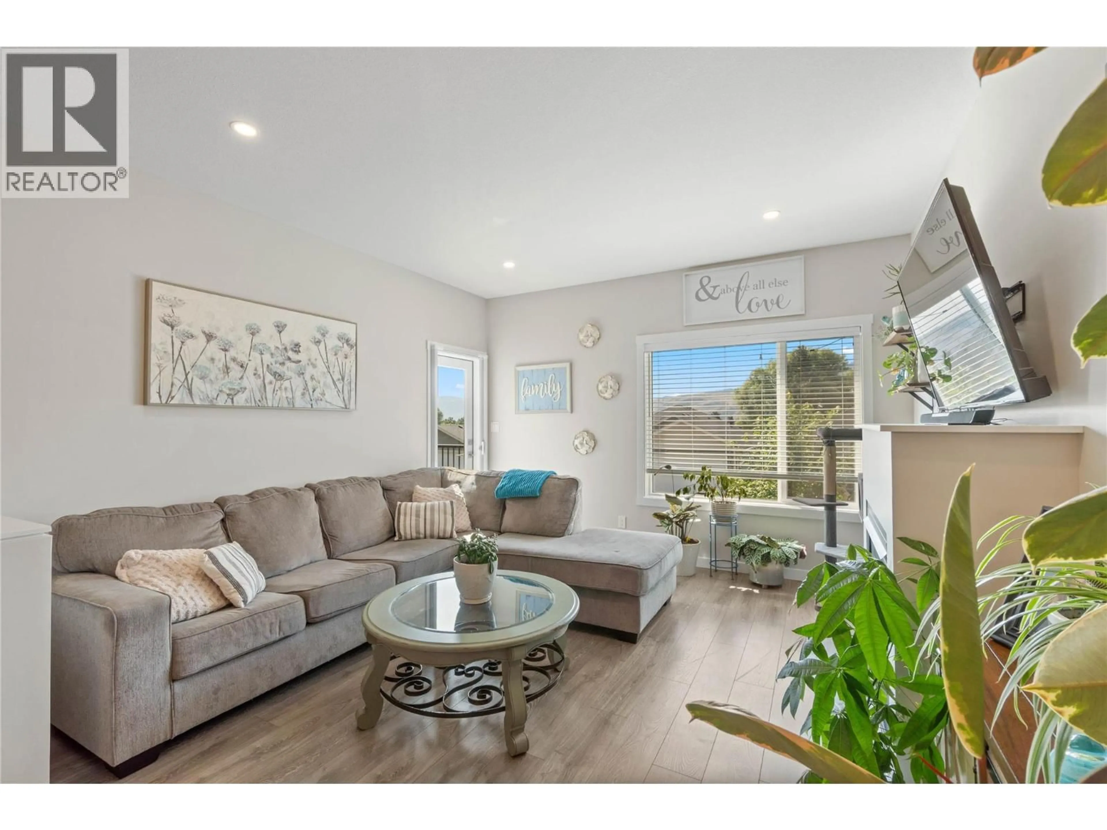 Living room with furniture, wood/laminate floor for 35 - 1900 ORD ROAD, Kamloops British Columbia V2B0B6