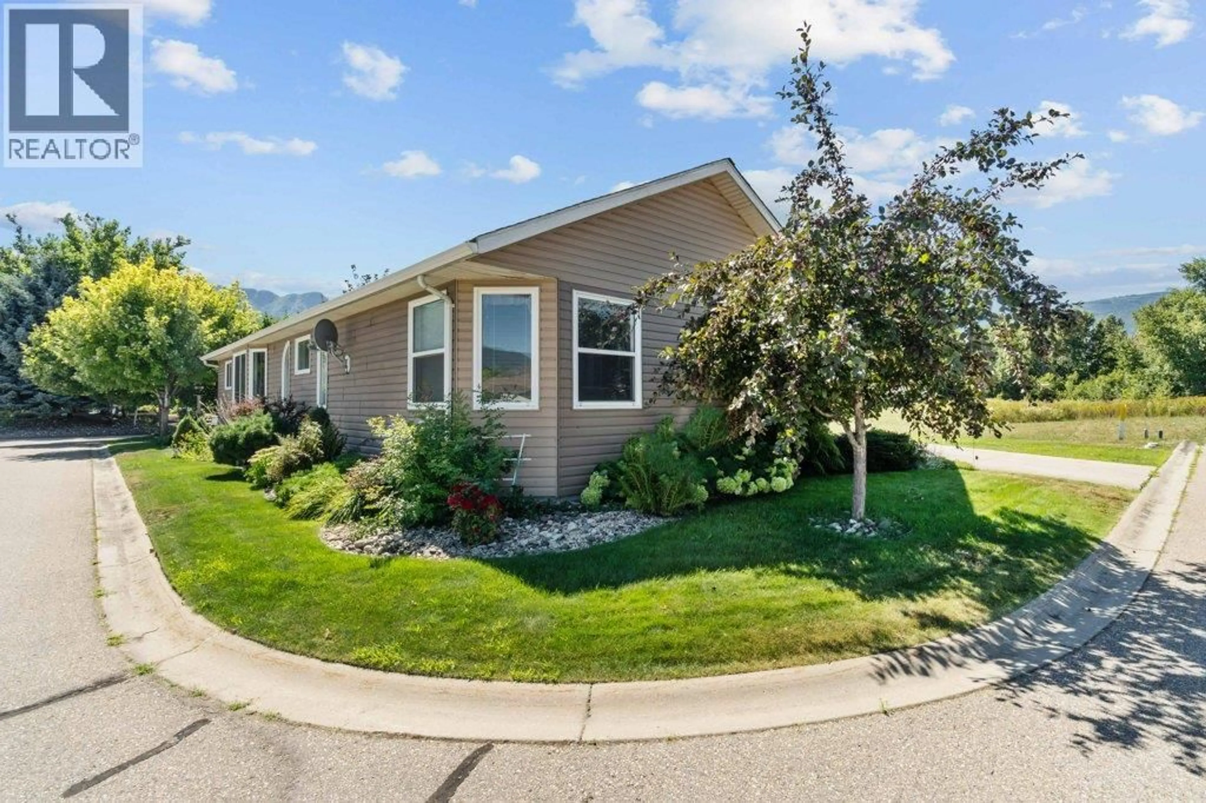 Home with vinyl exterior material, street for 21 - 601 BEATTY AVENUE NORTHWEST, Salmon Arm British Columbia V1E3J6