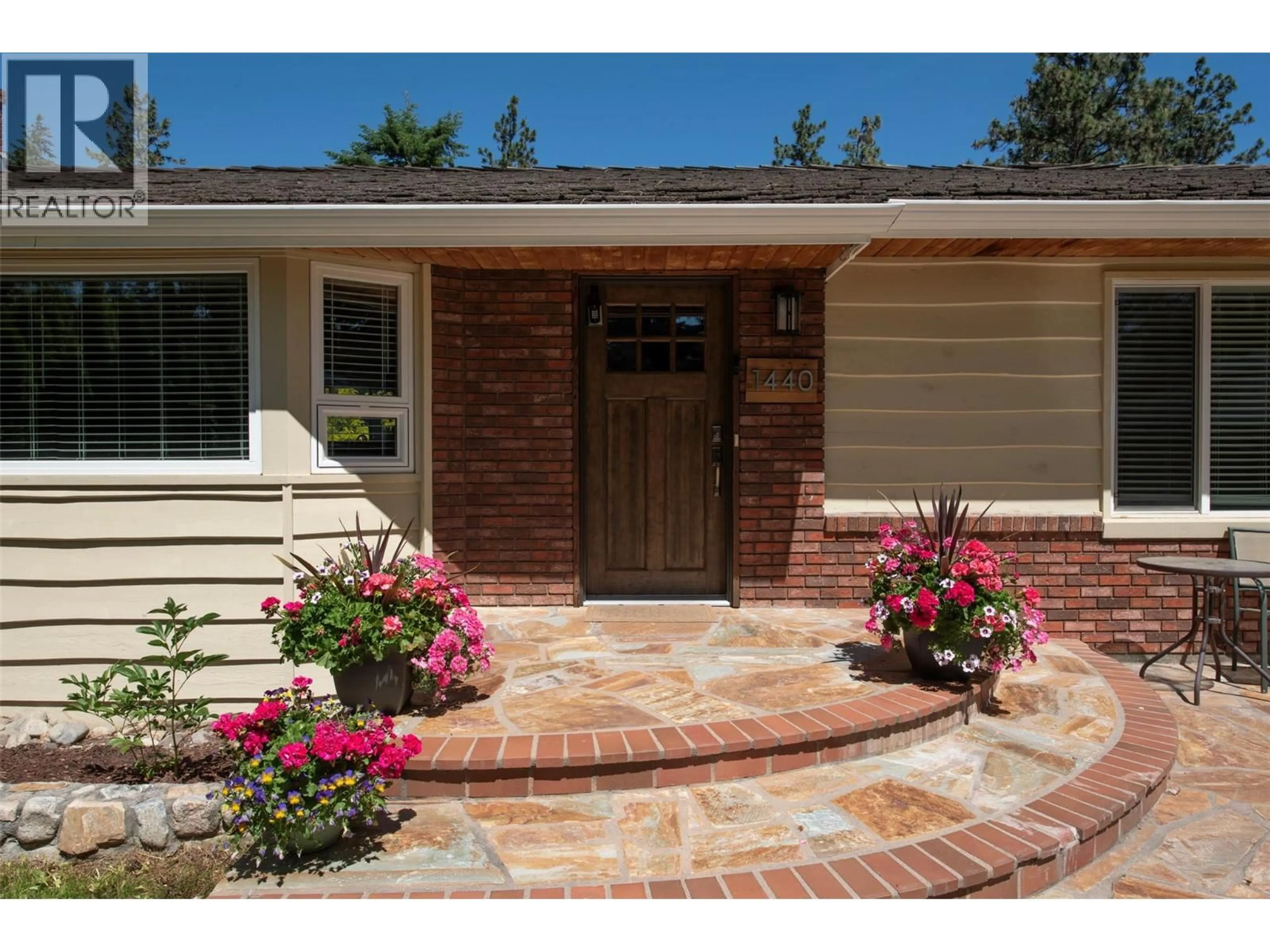 Home with brick exterior material, street for 1440 MISSION RIDGE DRIVE, Kelowna British Columbia V1W3B1