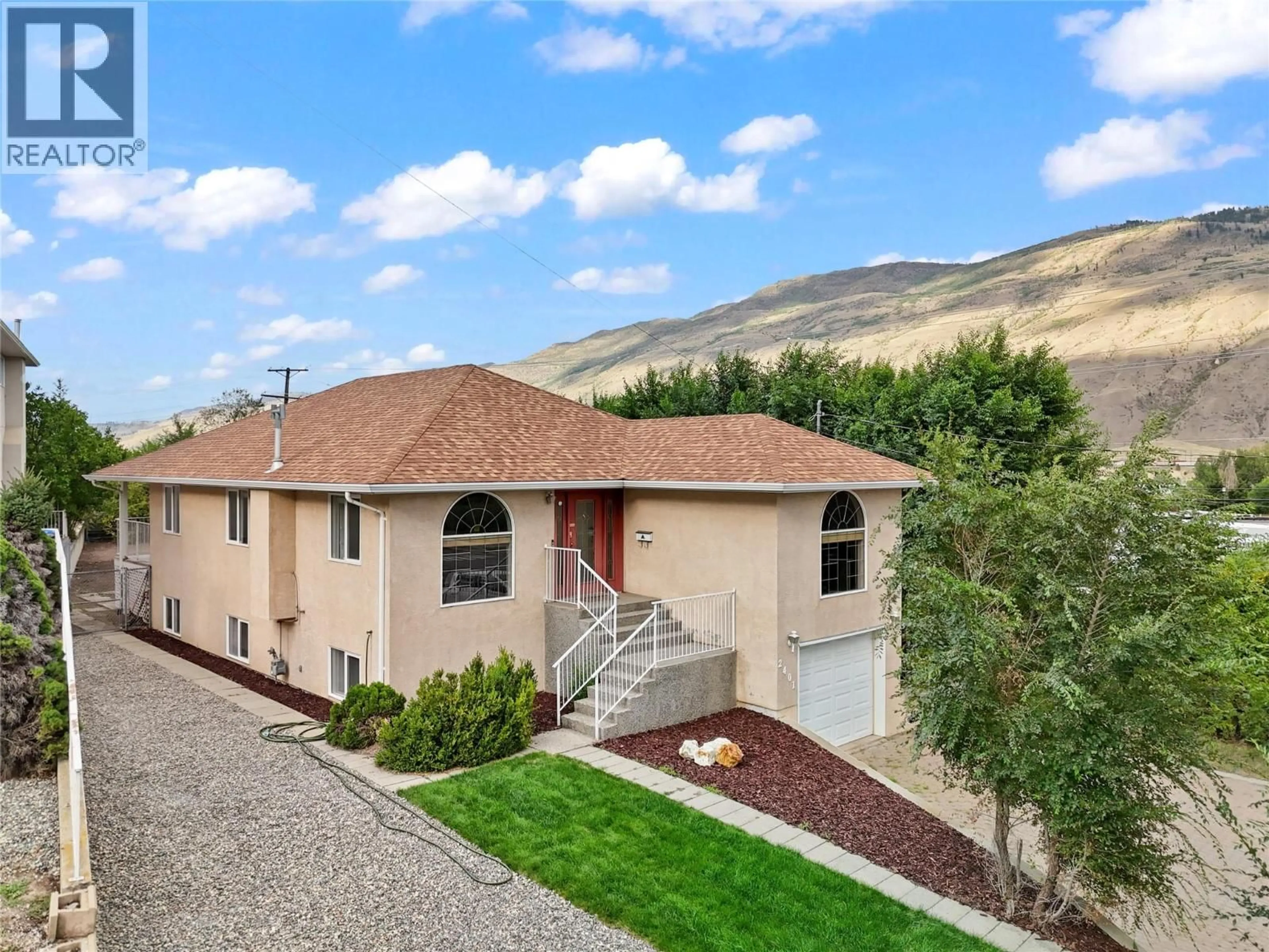 A pic from outside/outdoor area/front of a property/back of a property/a pic from drone, mountain view for 2401 PARKVIEW DRIVE, Kamloops British Columbia V2B7H9