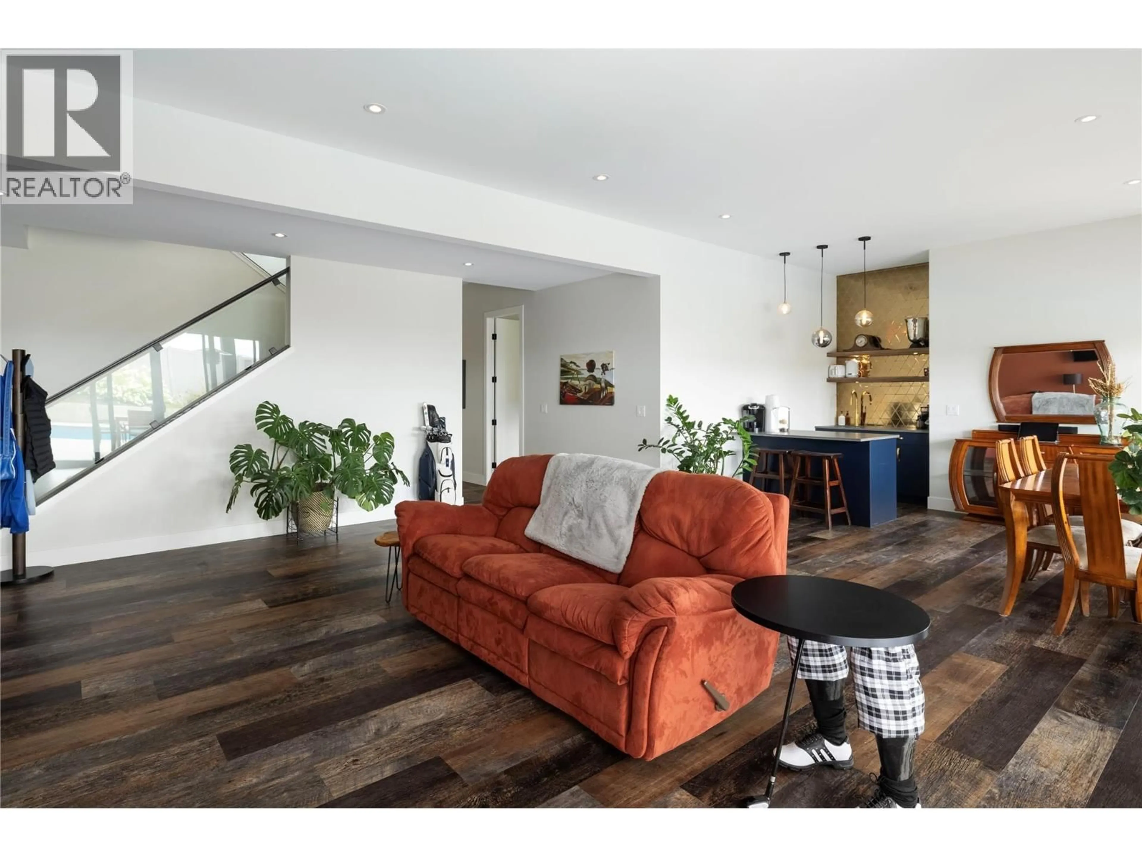 Living room with furniture, wood/laminate floor for 640 MT. IDA CRESCENT, Coldstream British Columbia V1B4G3